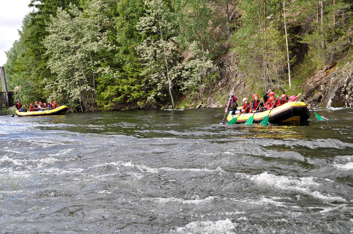 Two yellow rafts on a river 