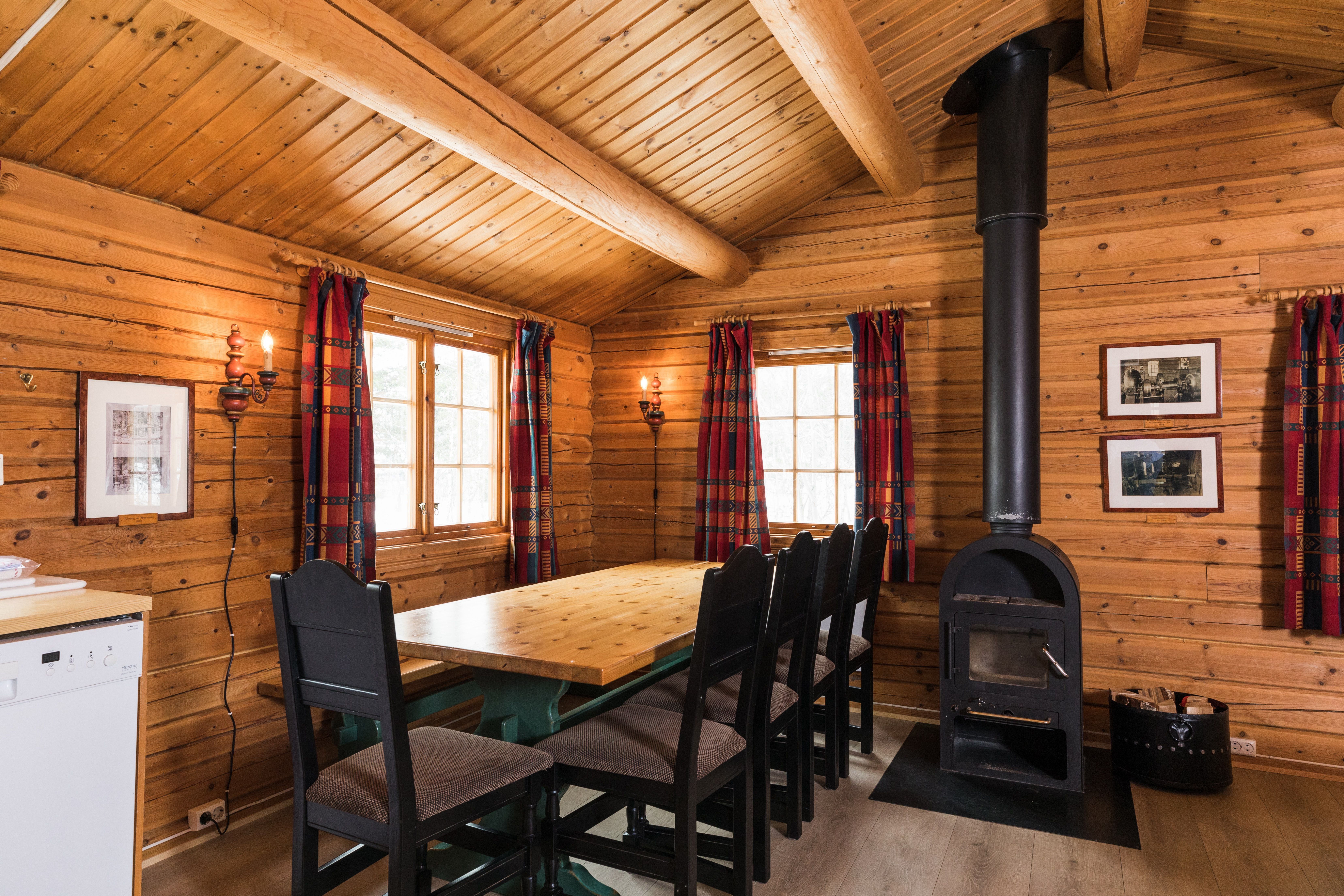 Shared lounge with dining table and fire place