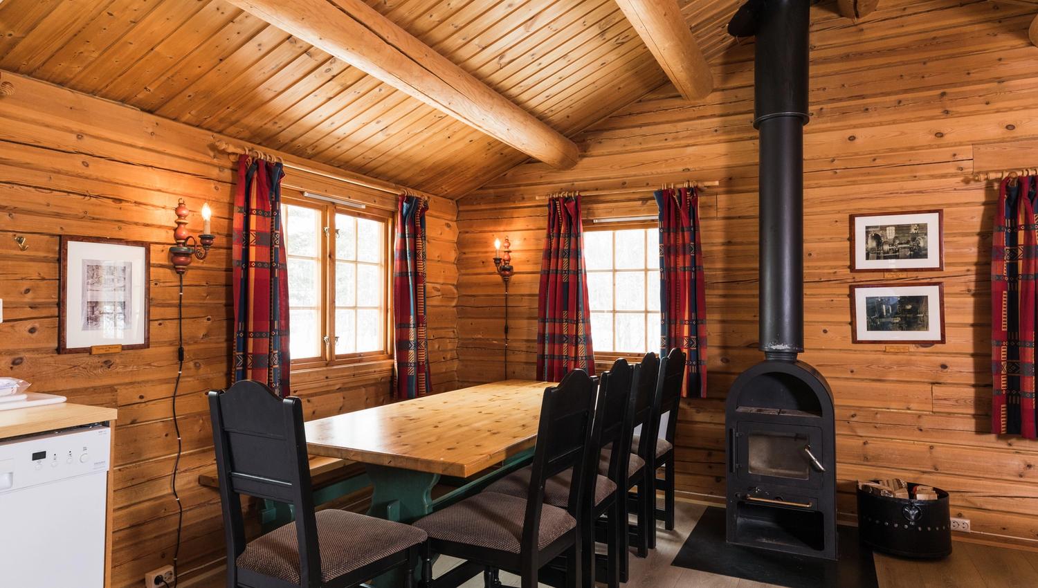 Shared lounge with dining table and fire place