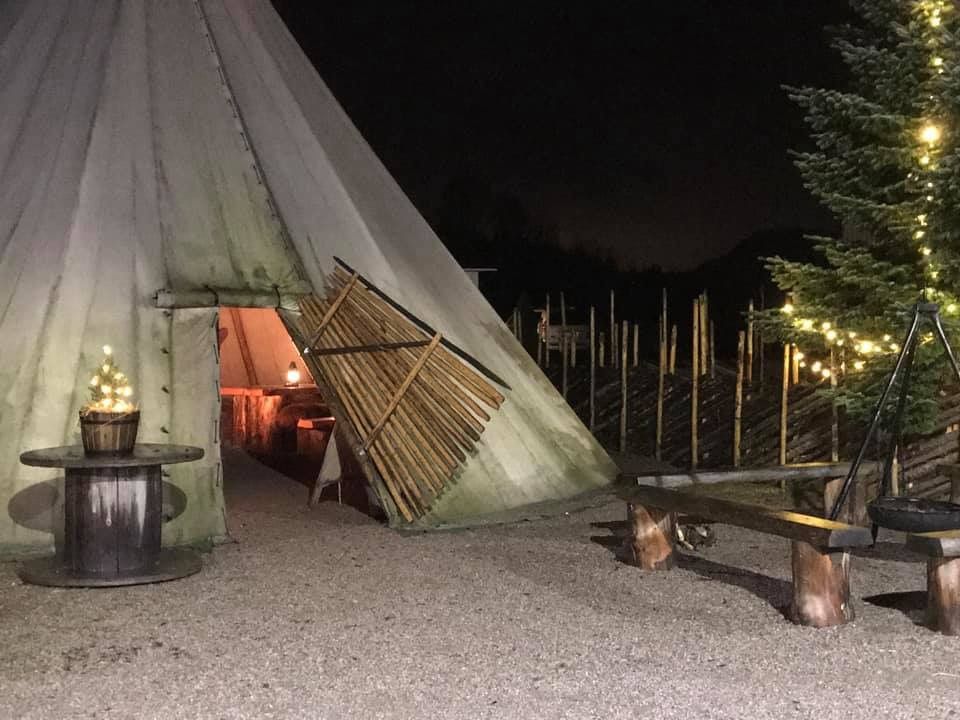 Lavvo with Christmas tree and lights outside