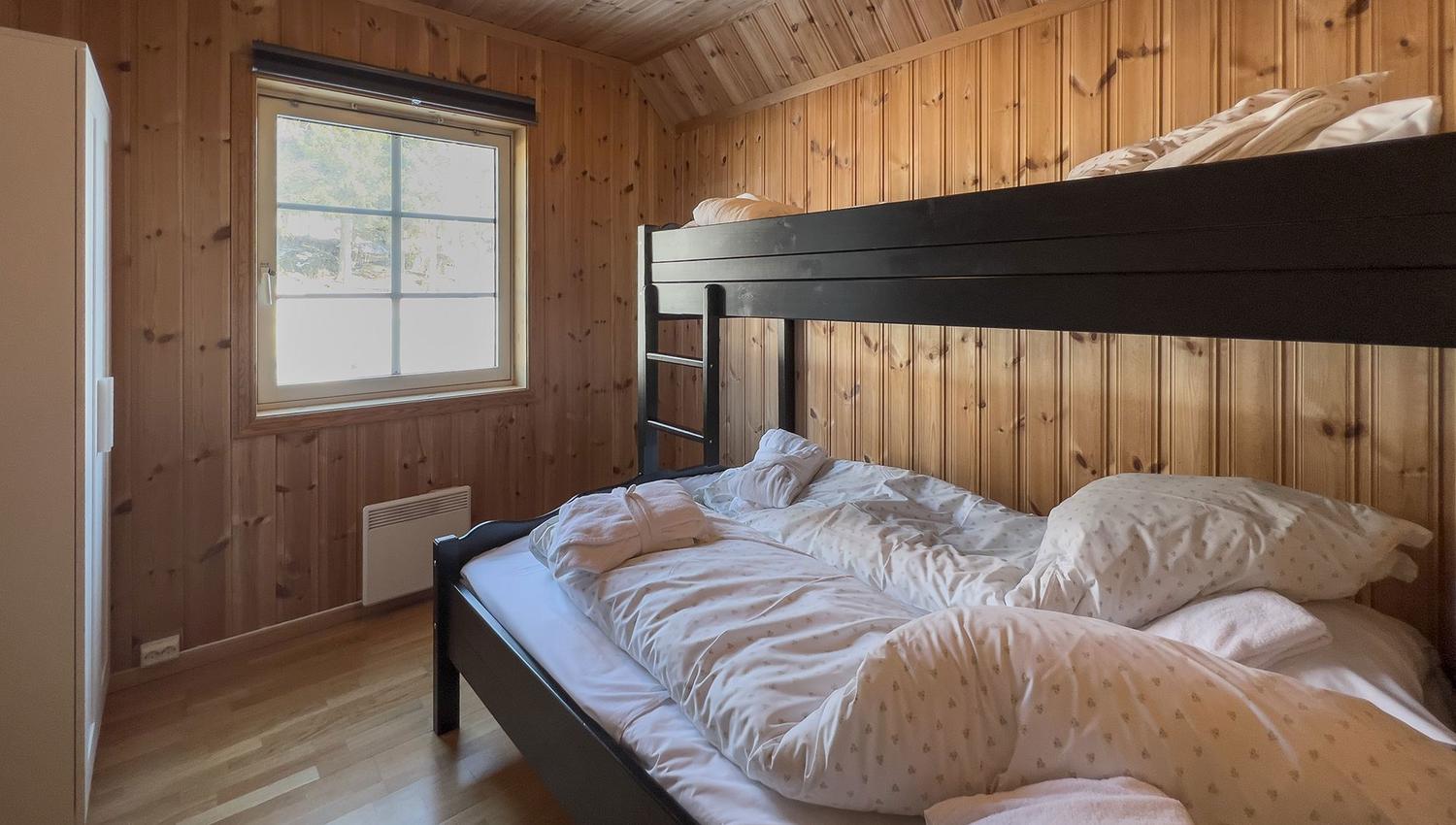 A bunk bed in a room.