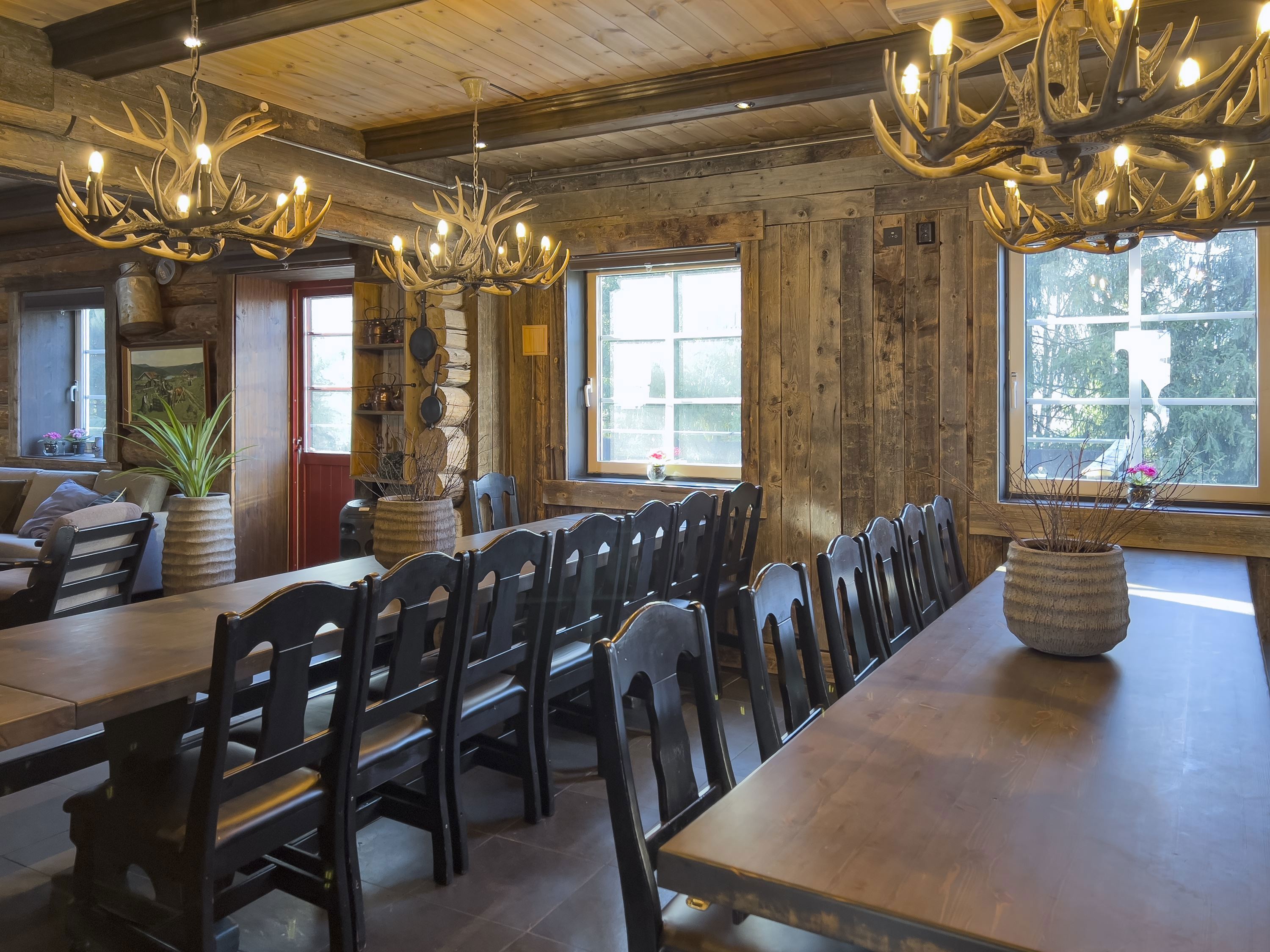 A room with a table and chairs.