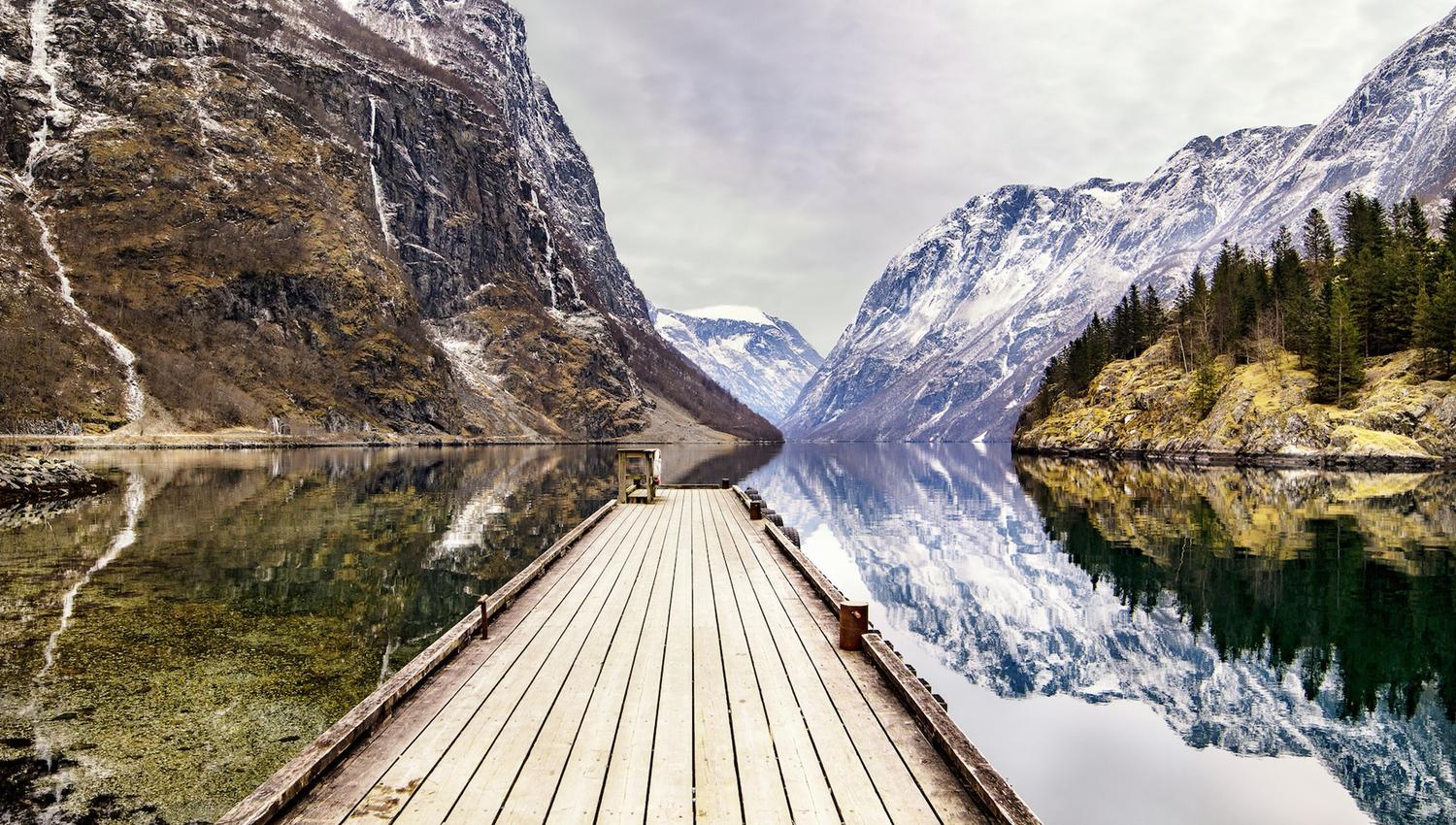 Snowy mountain peaks in the fjords