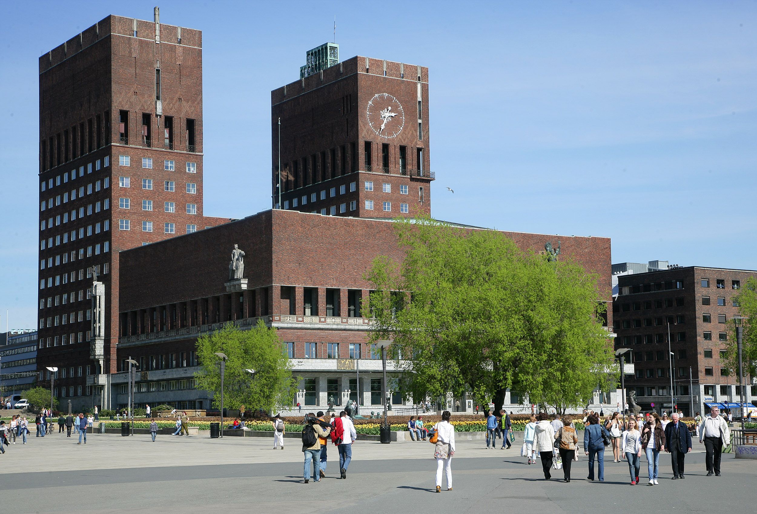 oslo town hall seen from the oslo fjord and town hall square