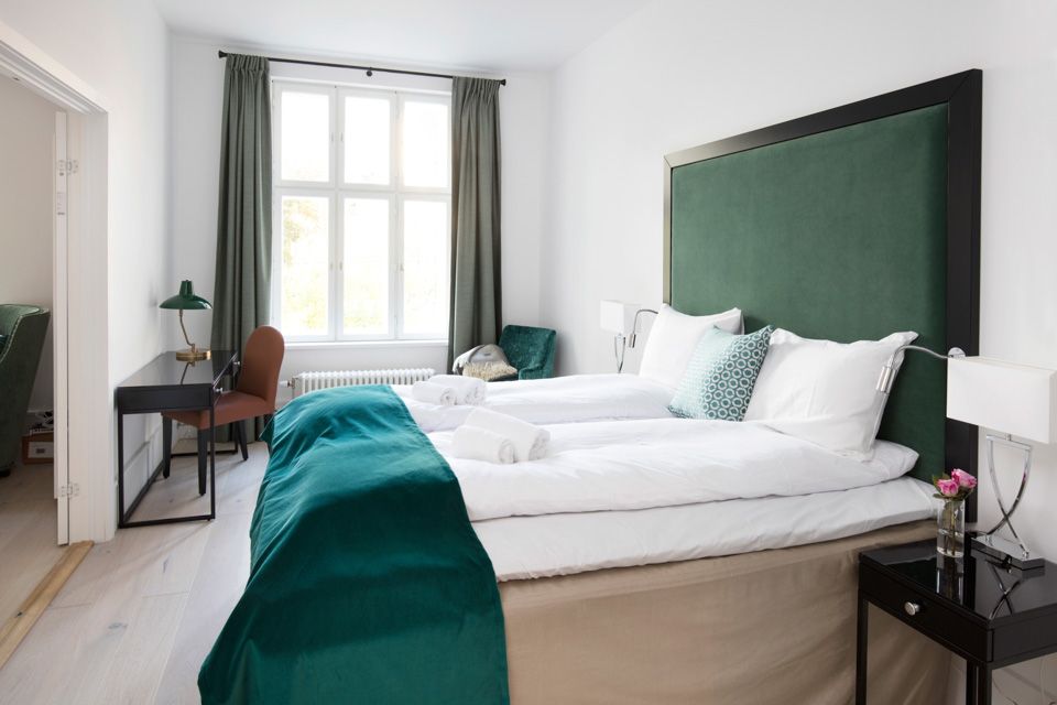 Soverom i grønt på Frogner House Apartments. Foto