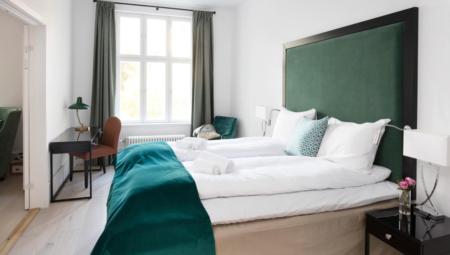Soverom i grønt på Frogner House Apartments. Foto