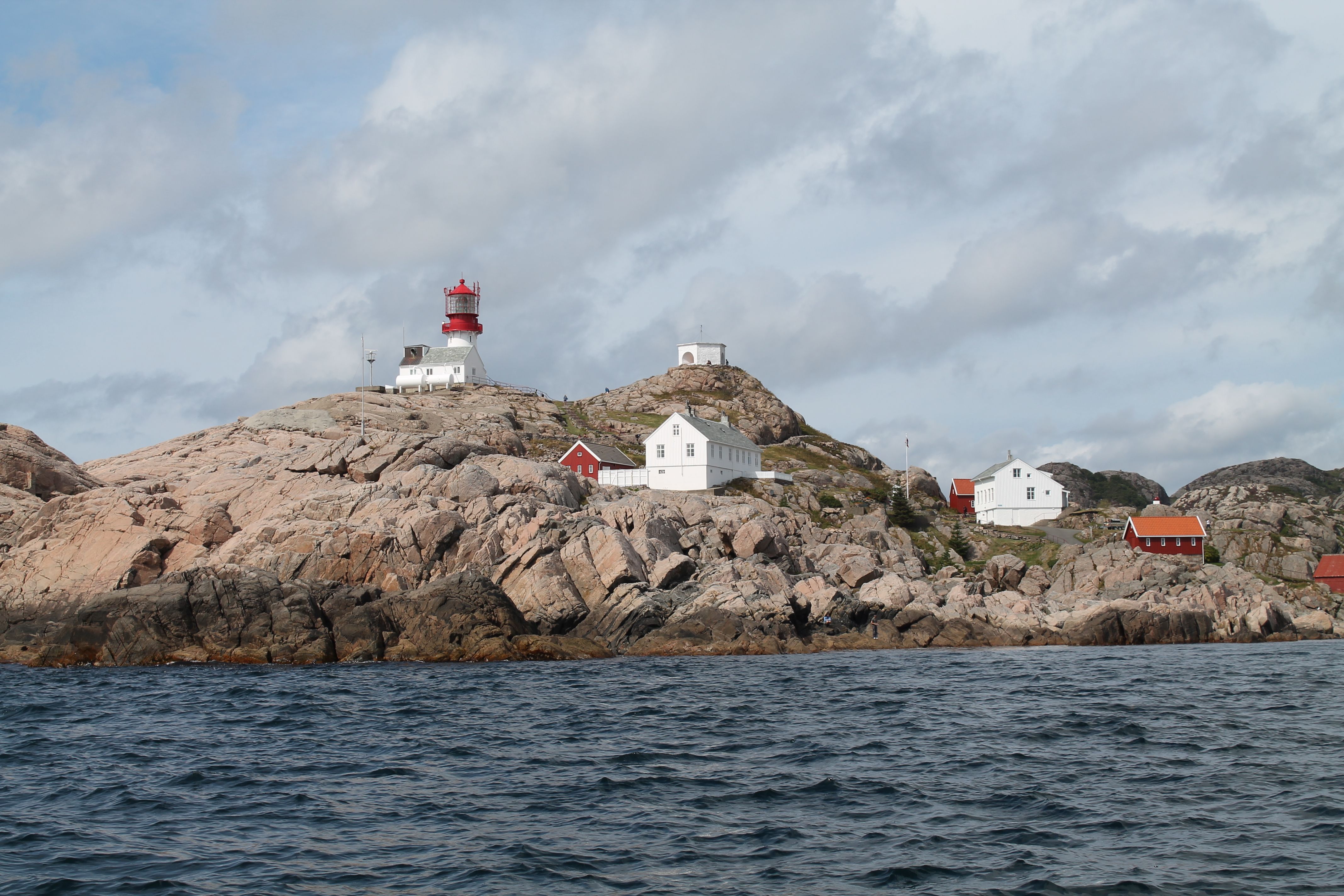 A view towards Lindesnes Lighthouse from the sea.