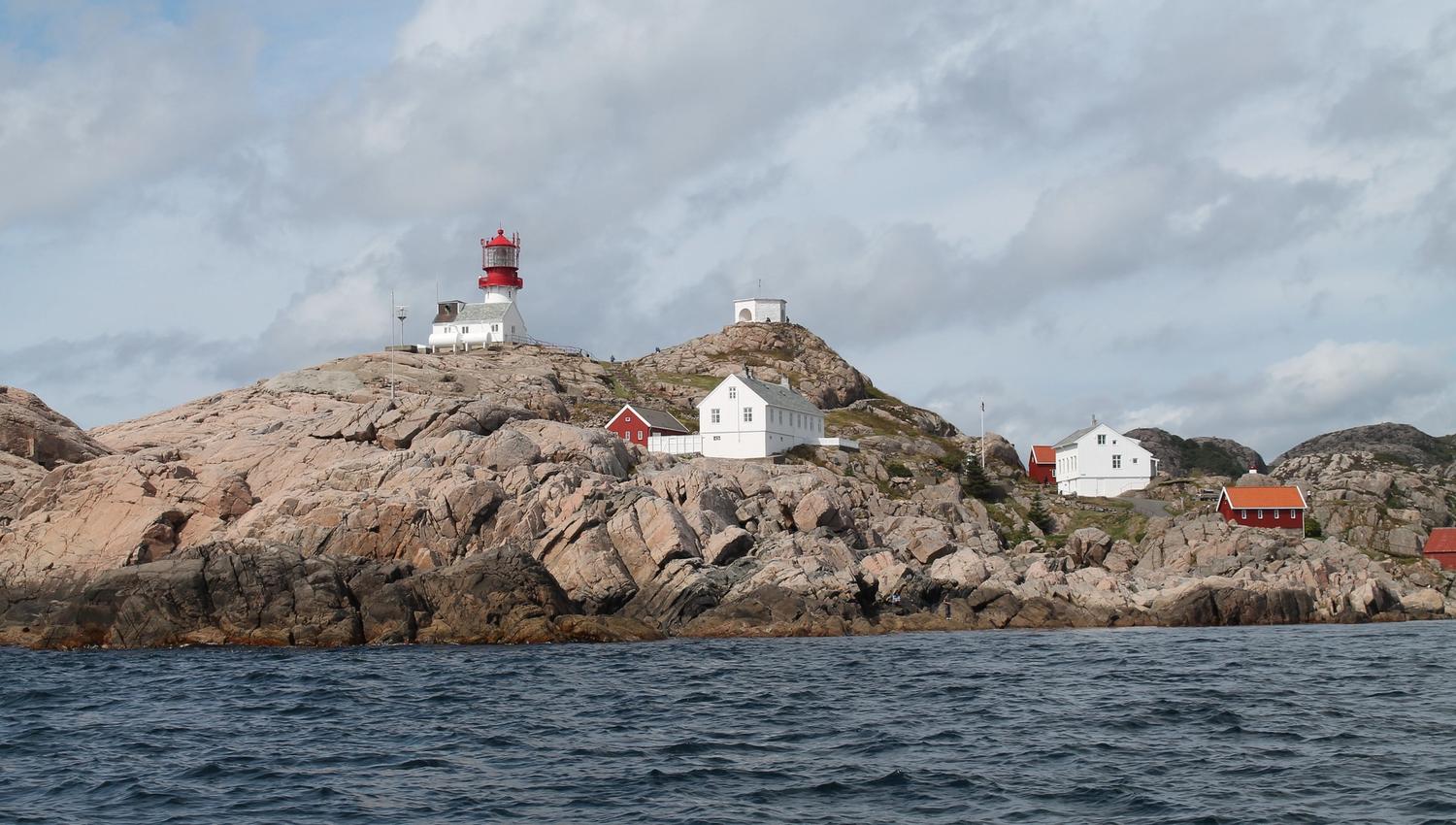 A view towards Lindesnes Lighthouse from the sea.
