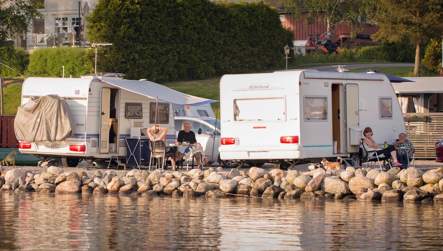 Two caravans near the water