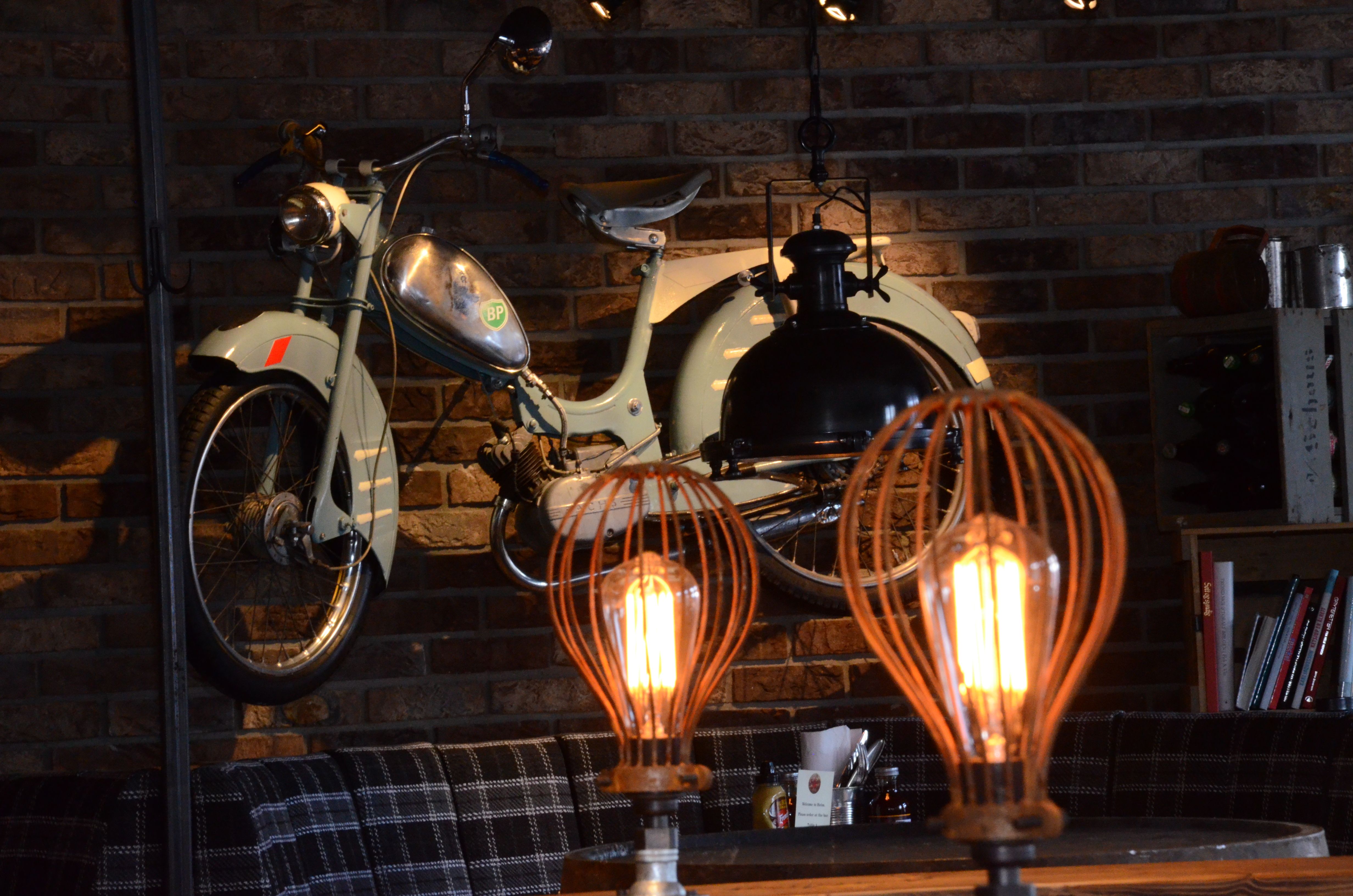 Motorcycle on the wall at Heim Gastropub
