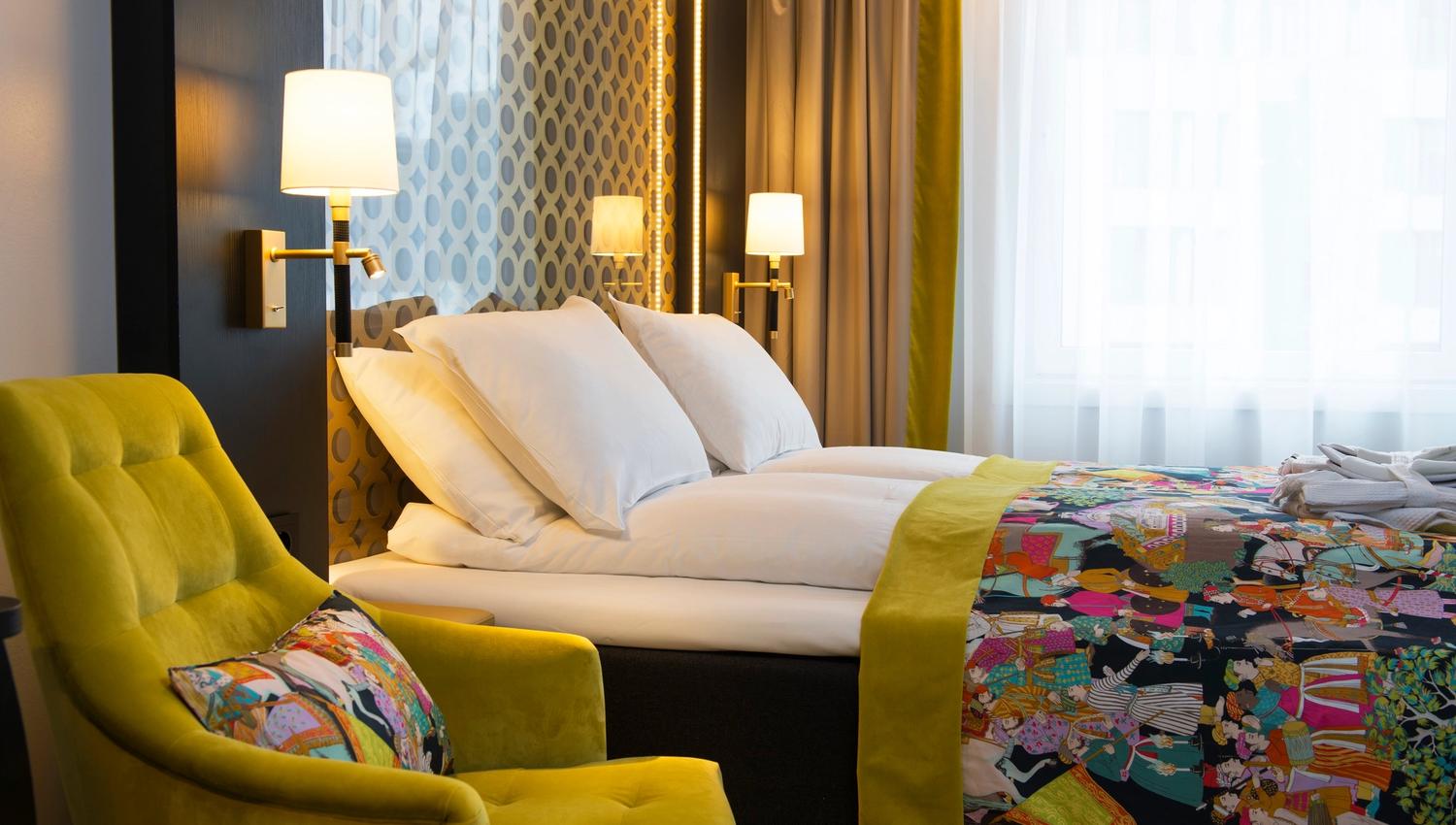 colourful double room with large windows