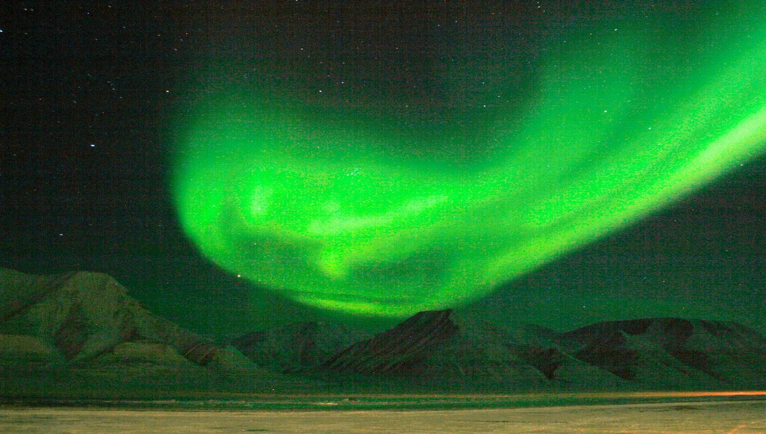 Northern light over mountain