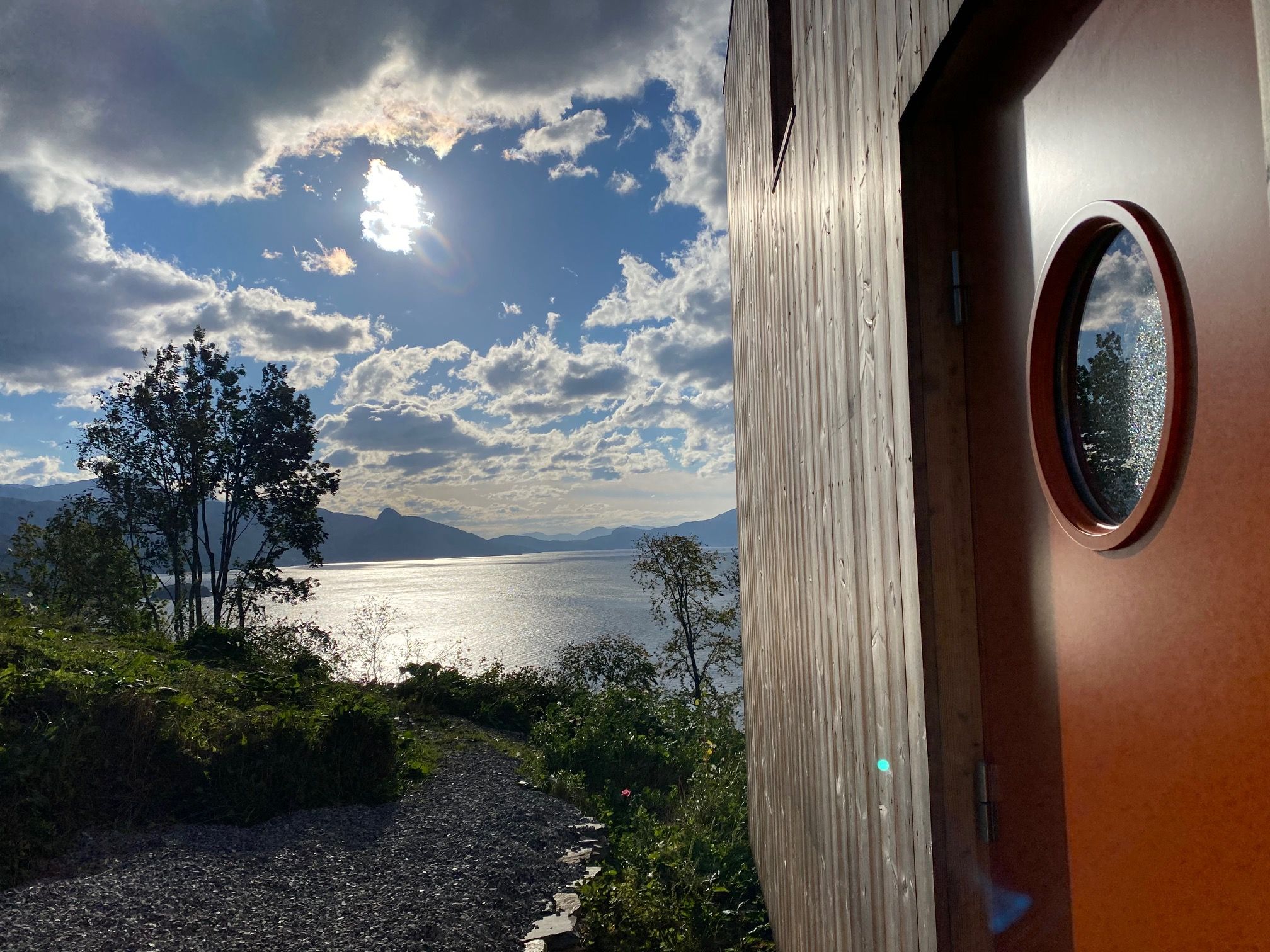 Sunny view from the cabin’s entrance over Hardangerfjord.