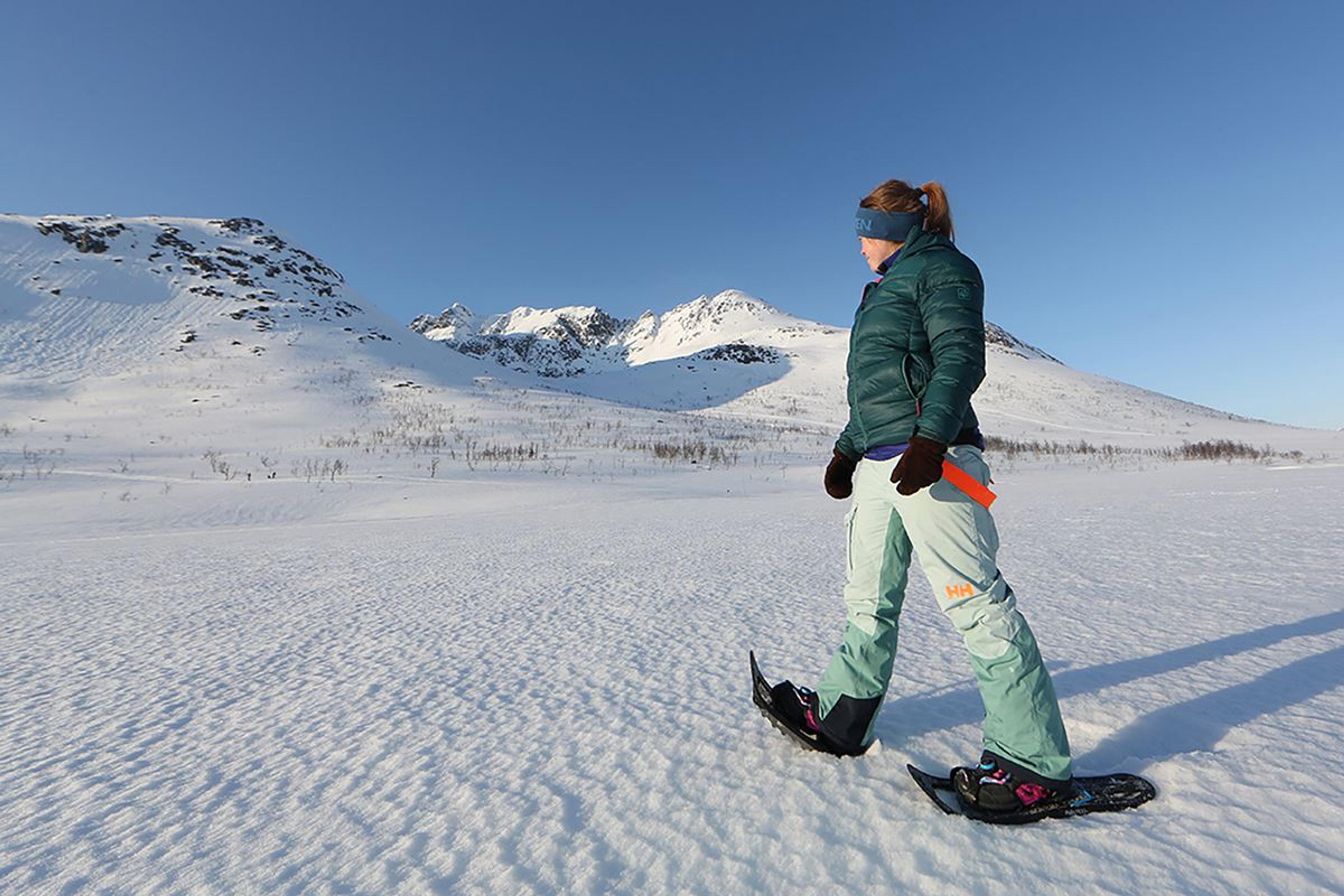 A person with snowshoes on