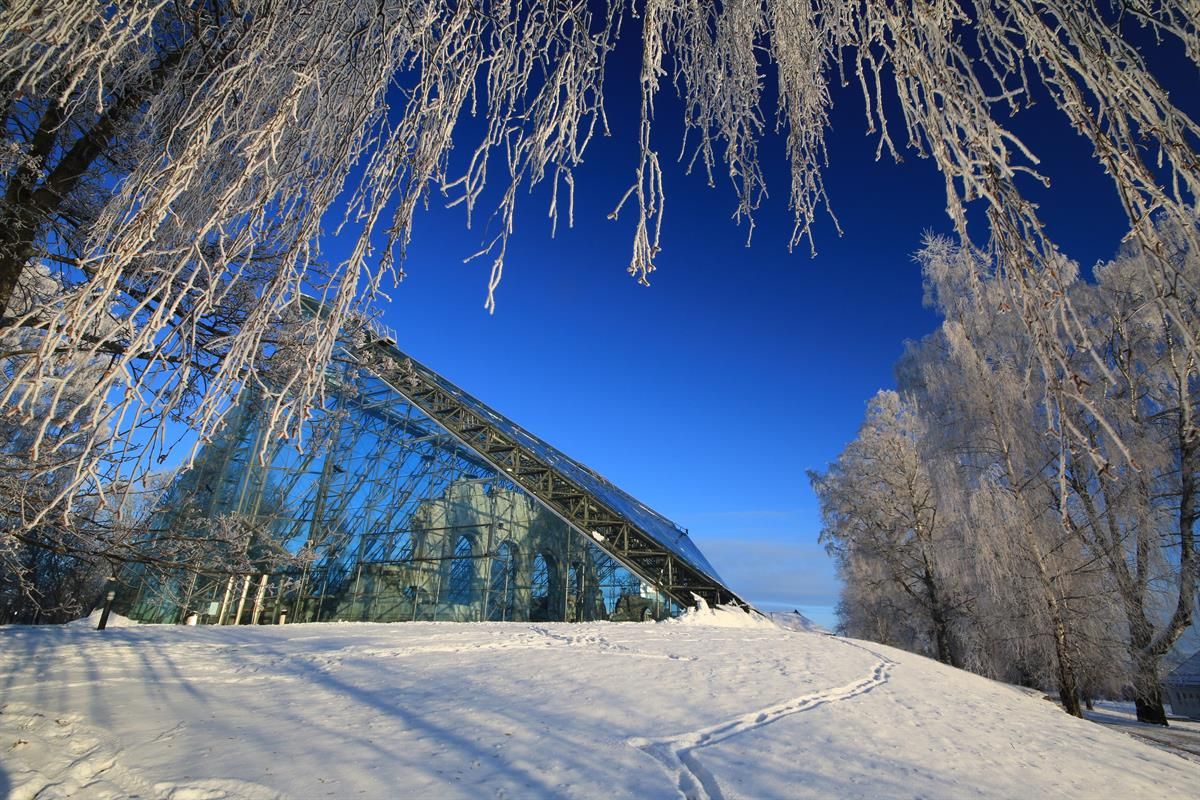 Ruins of domkirkeodden. Photo taken from the outside. Winter and blue sky.