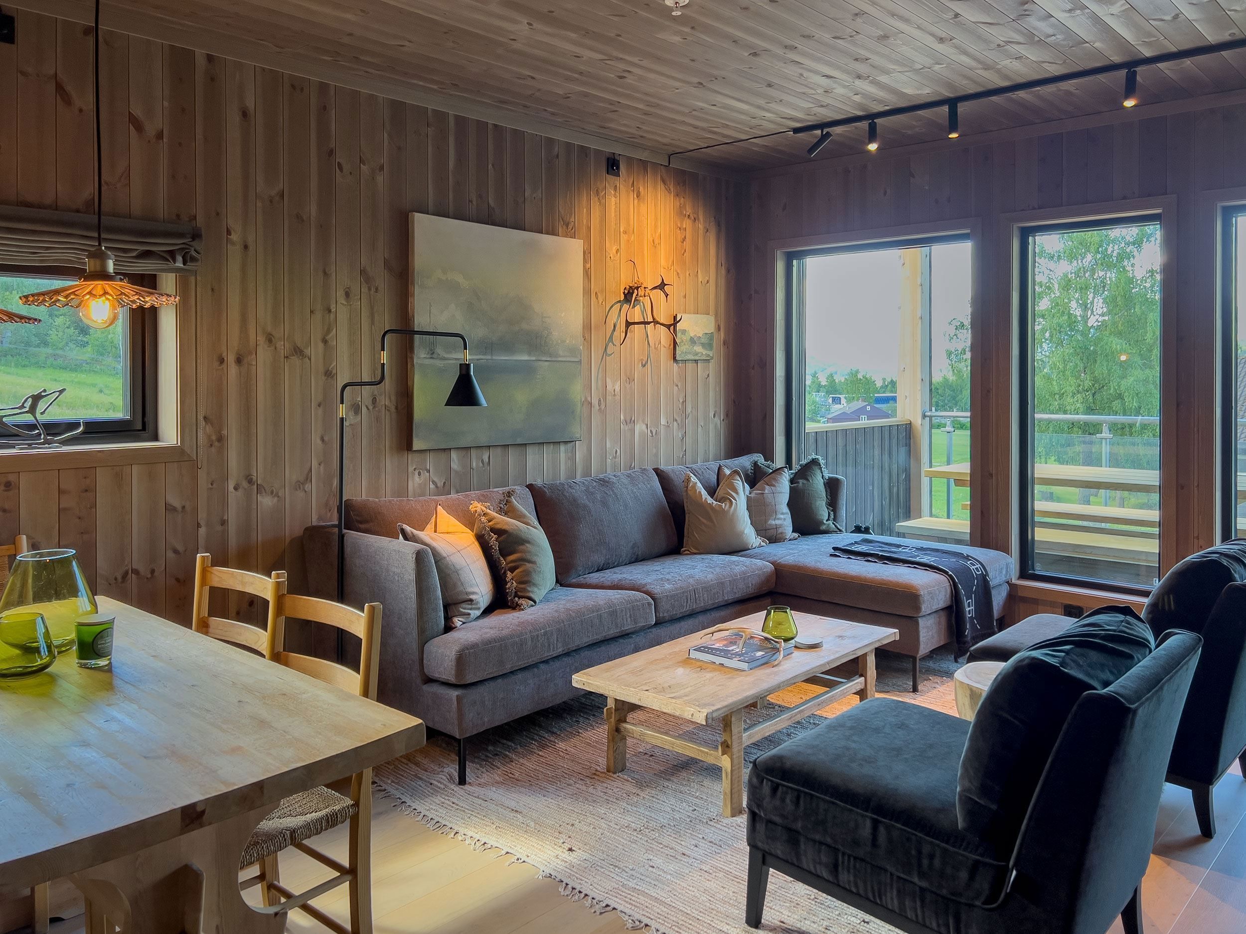 A living room with sofa and table.