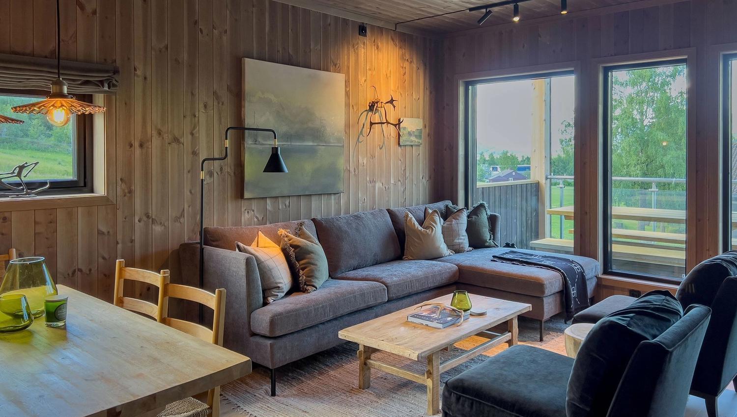 A living room with sofa and table.