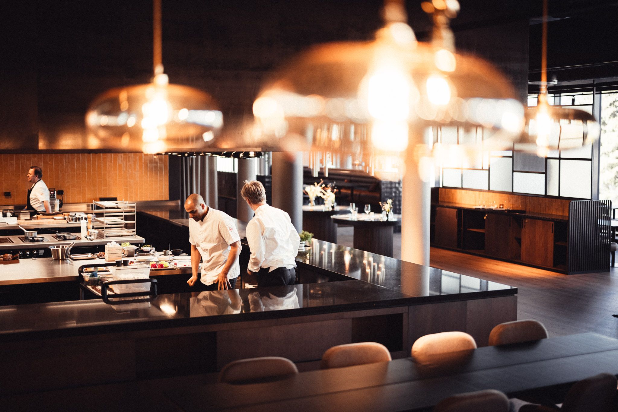 kitchen with chefs making food 