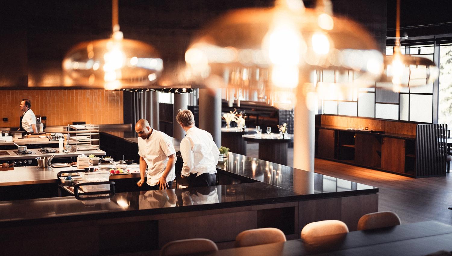 kitchen with chefs making food