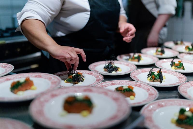Plates with food ready to be served. 