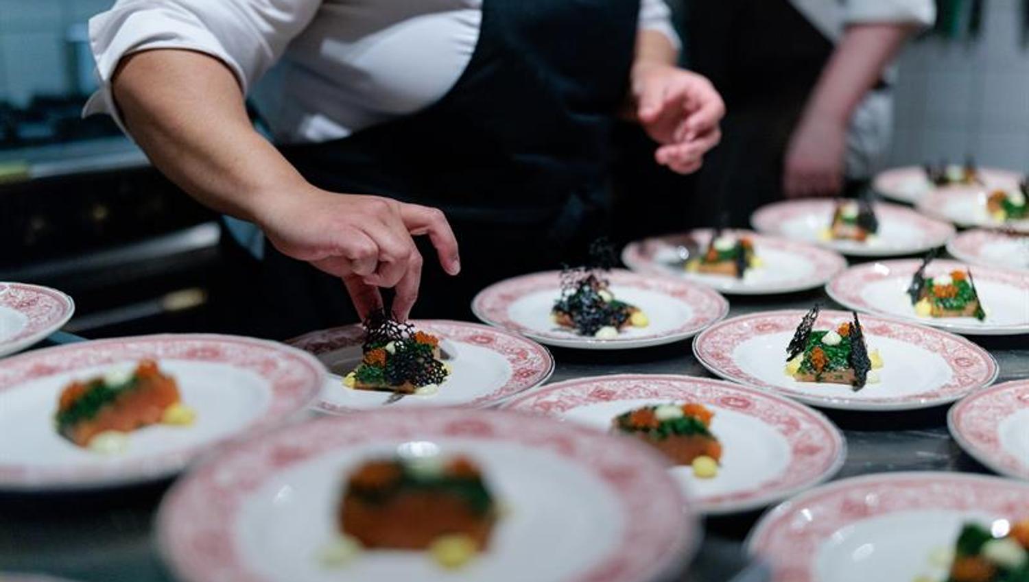 Plates with food ready to be served.