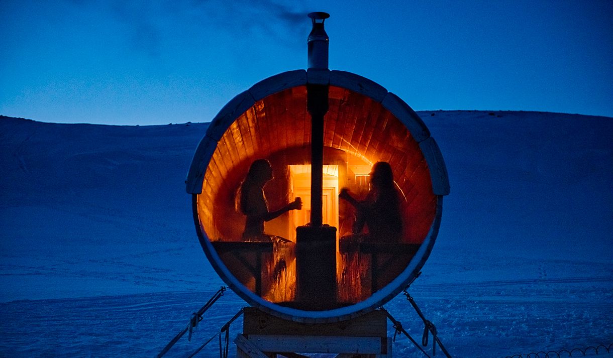 People enjoying a stay in the sauna in the evening