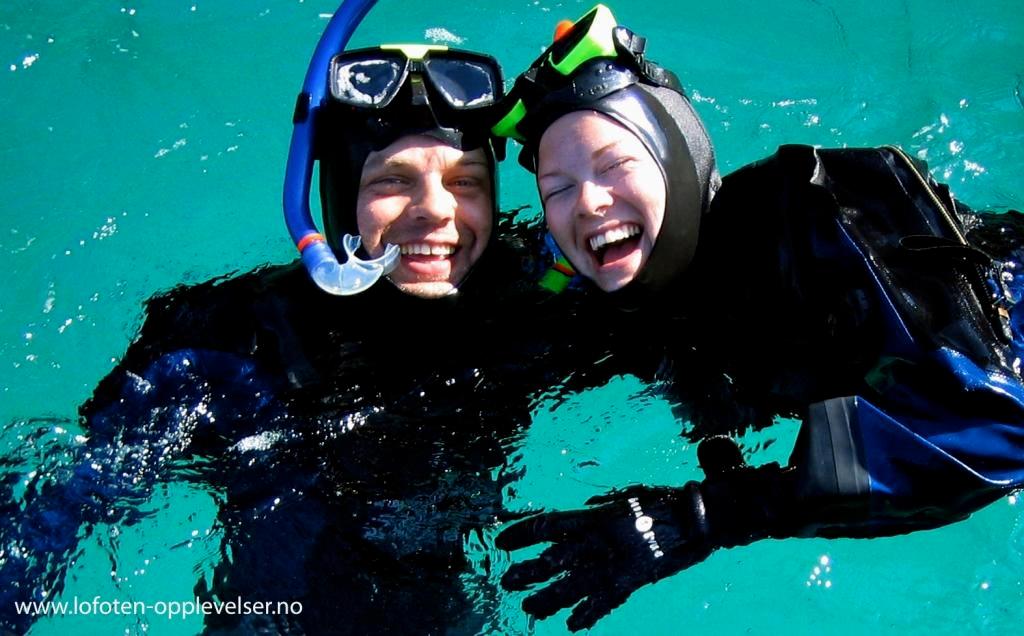 Experiencing snorkelling in crystal clear arctic waters