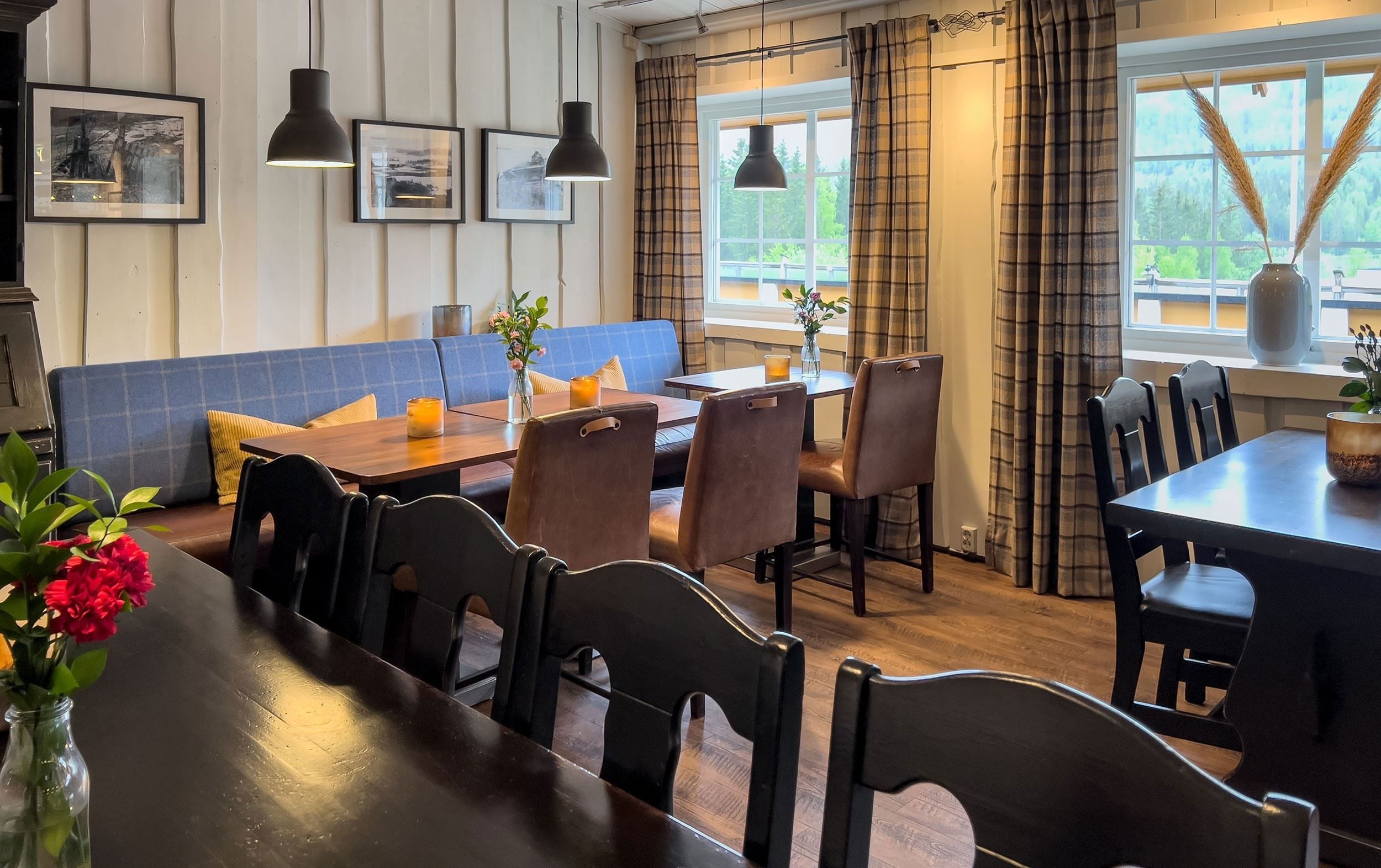 Restaurant with table and chairs.