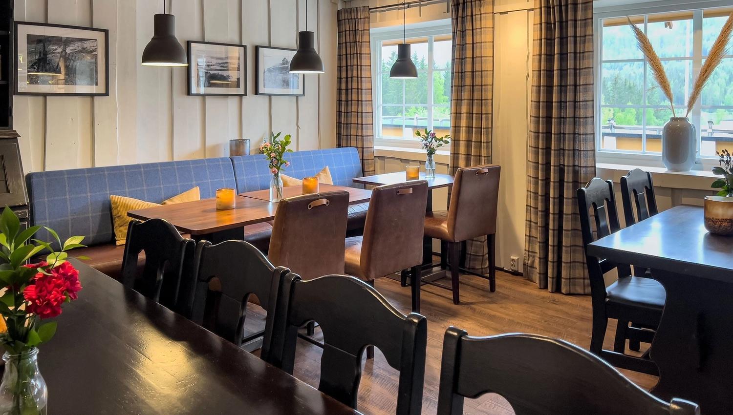 Restaurant with table and chairs.