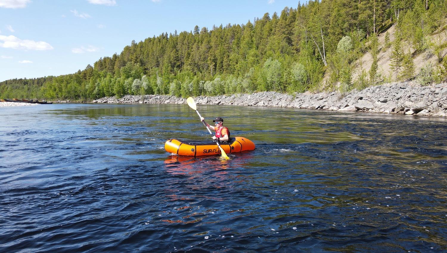 Experience the thrill of kayaking on serene waters! Glide through stunning landscapes as you paddle your way down the river, with lush greenery and rocky shores offering a picturesque backdrop.