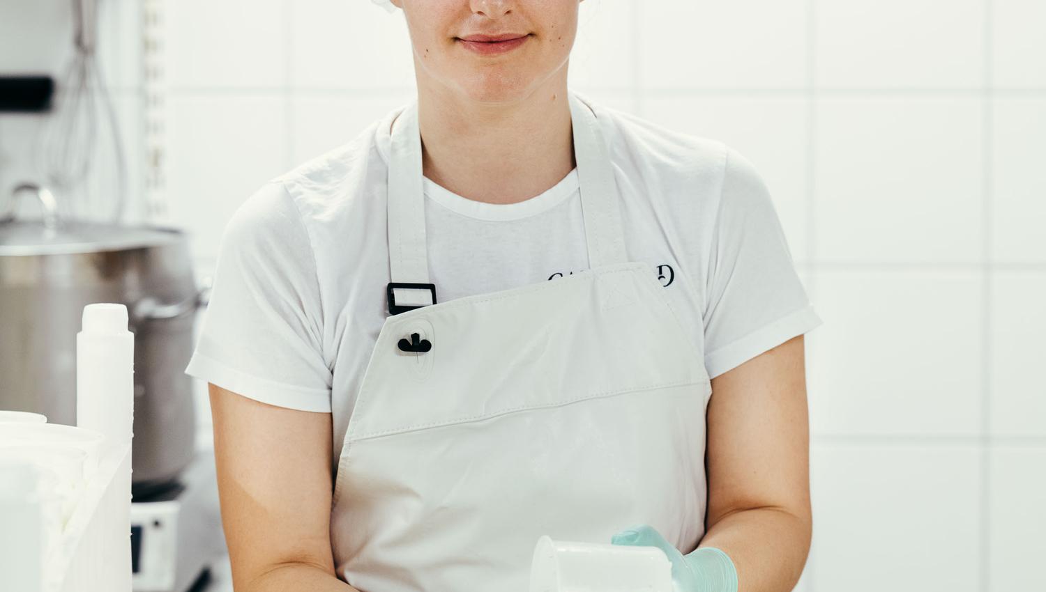 Daugher-in-law Maren turning the cheese