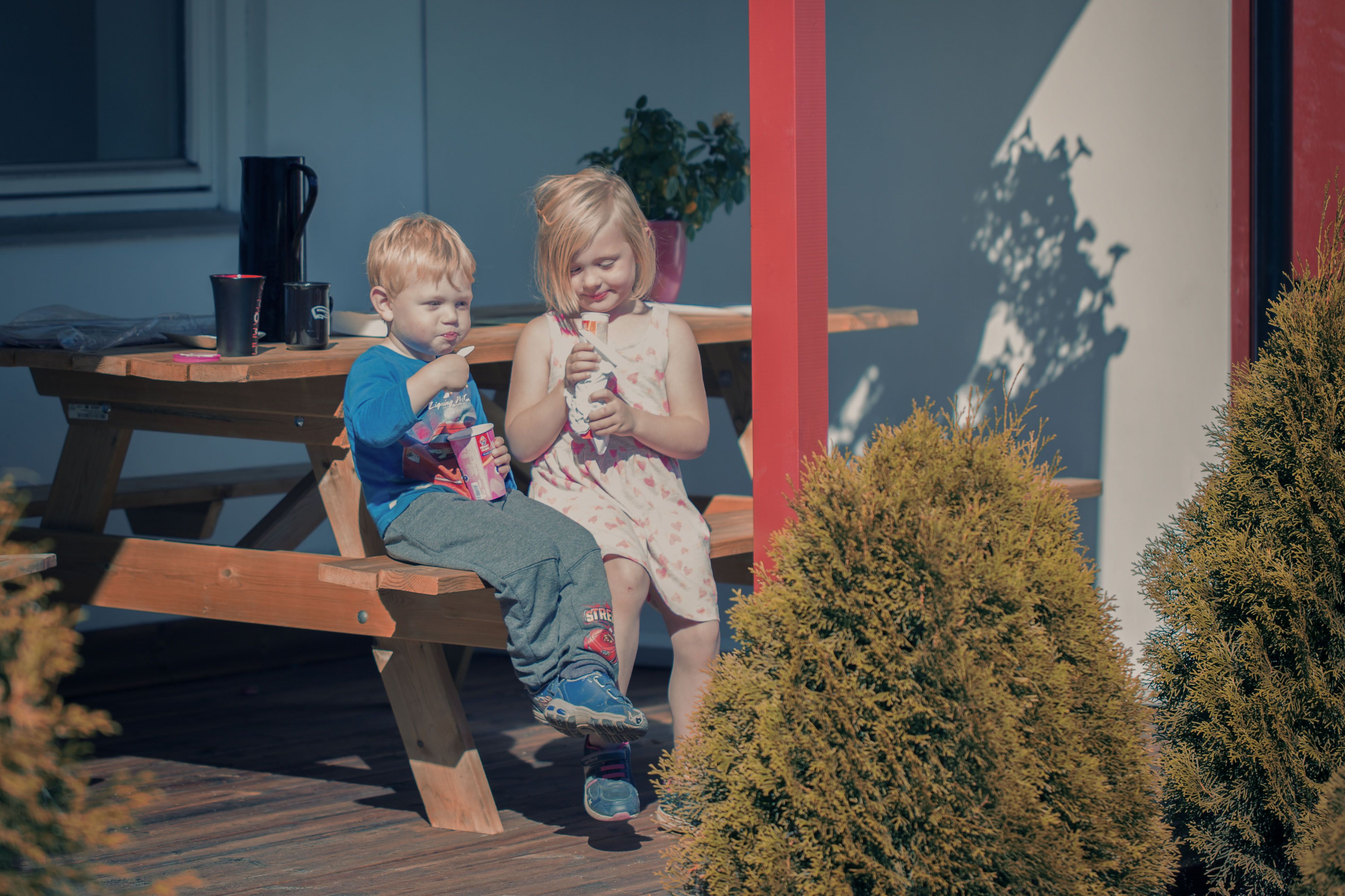 Two children eating ice cream