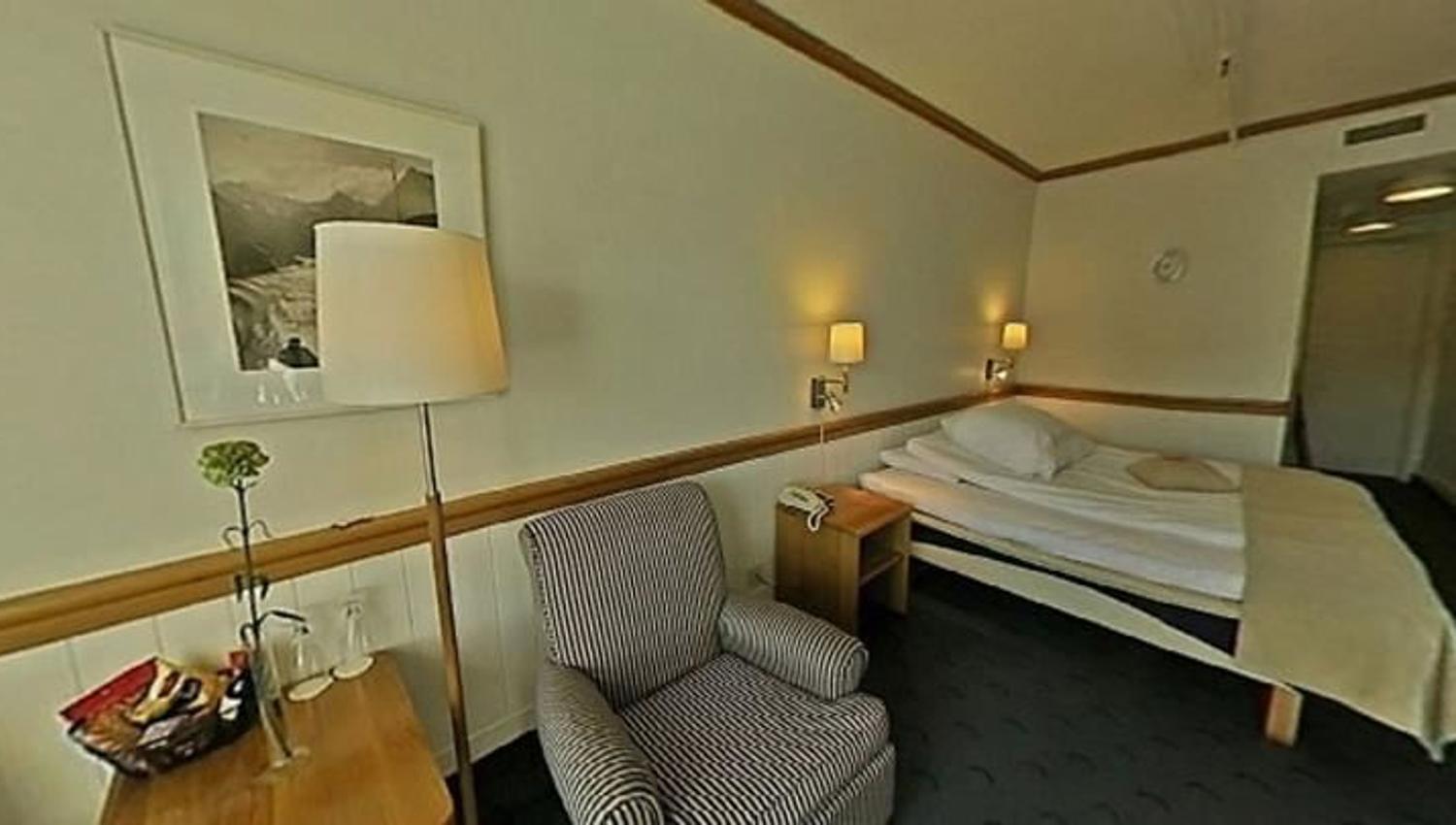 Bed and chair in the room