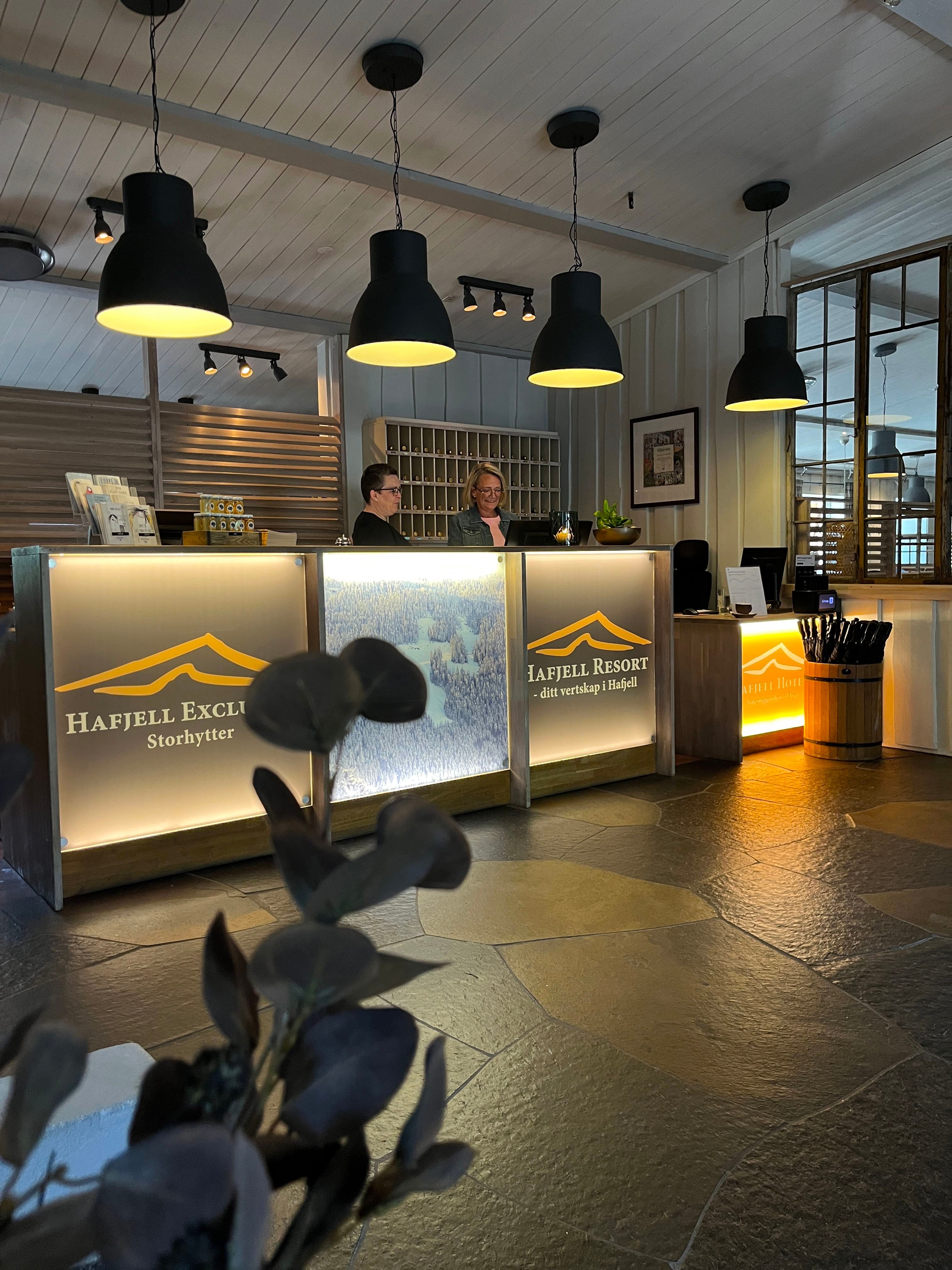 A person at a reception desk.