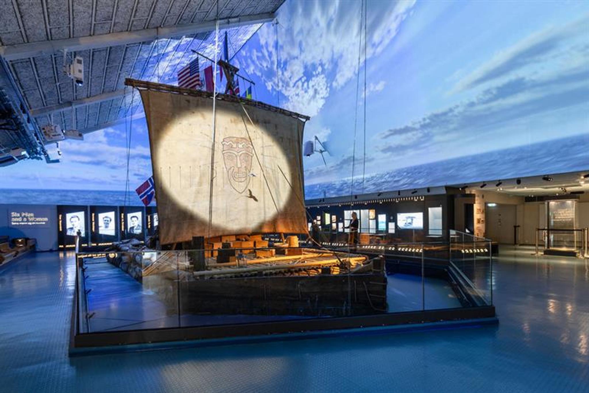 The Kon-Tiki raft surrounded by a cloudy sky on screen