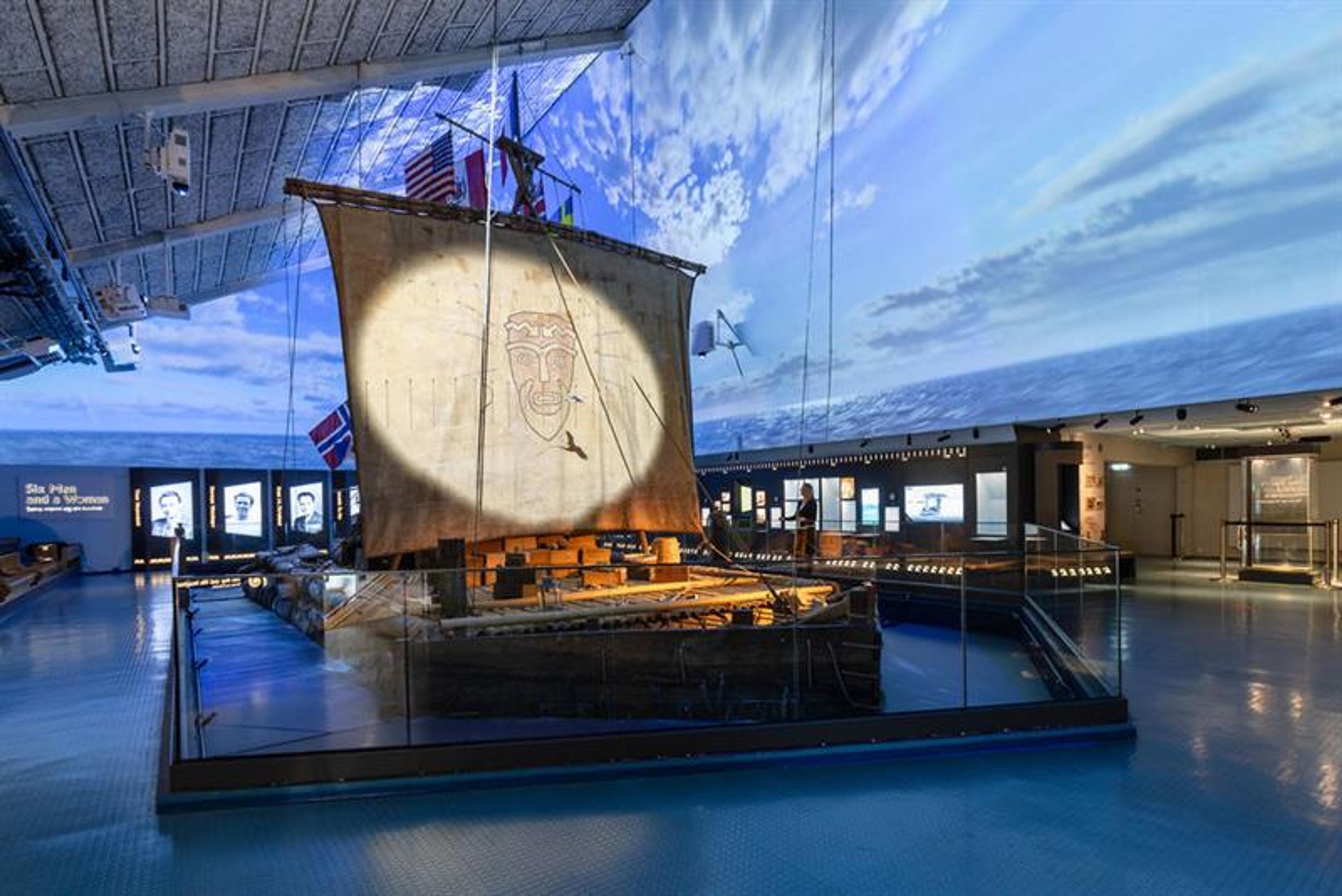 The Kon-Tiki raft surrounded by a cloudy sky on screen