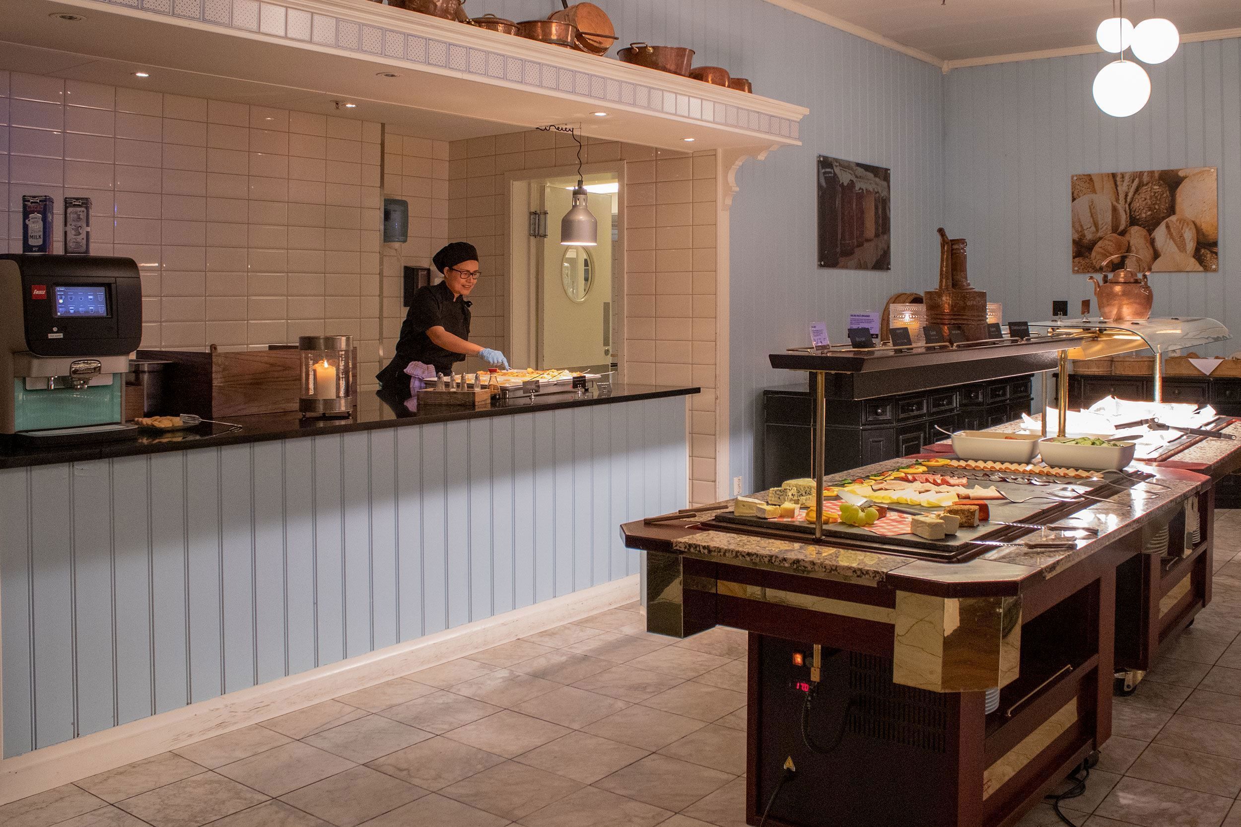 A person who cooks in the kitchen.