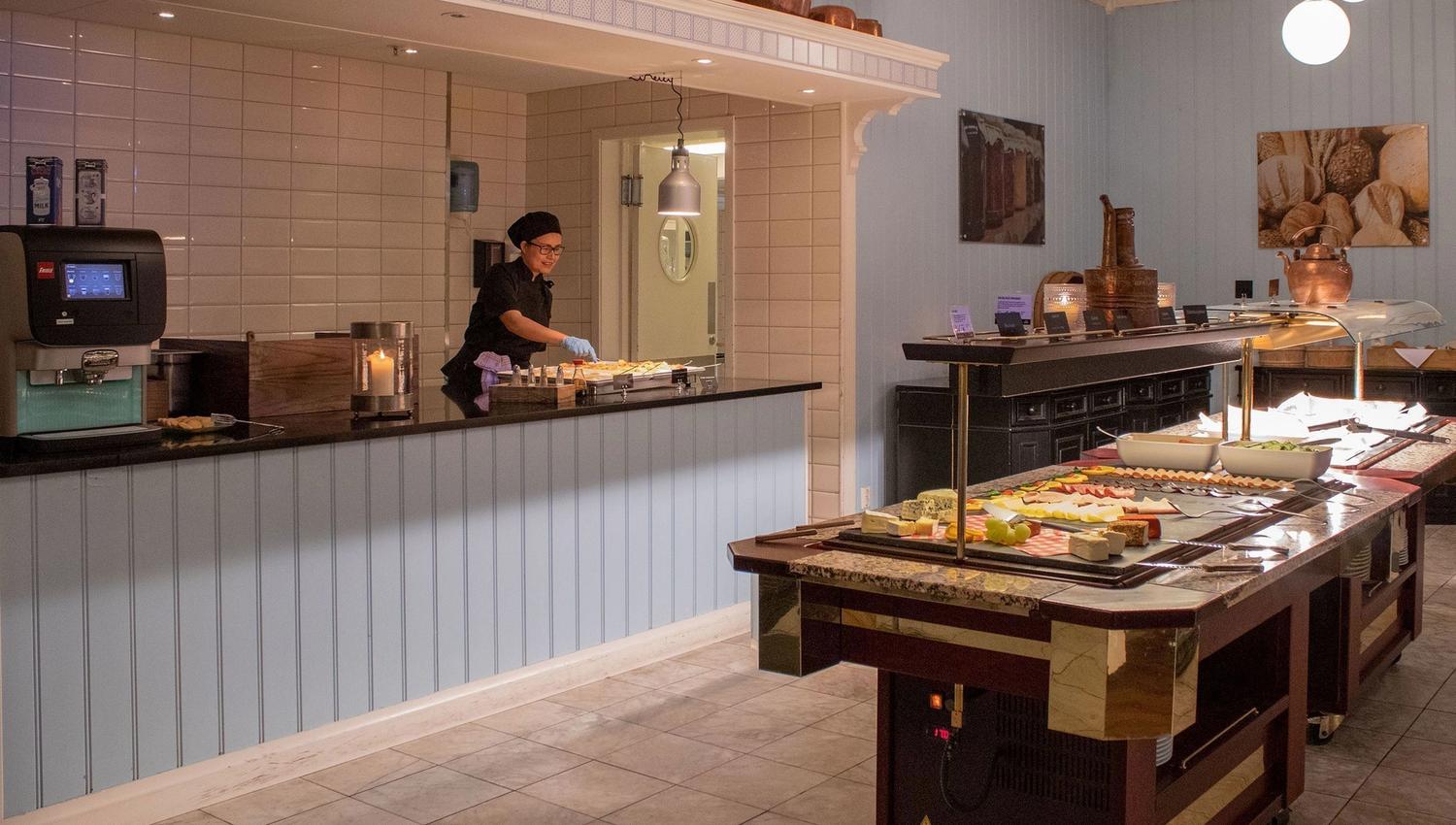 A person who cooks in the kitchen.