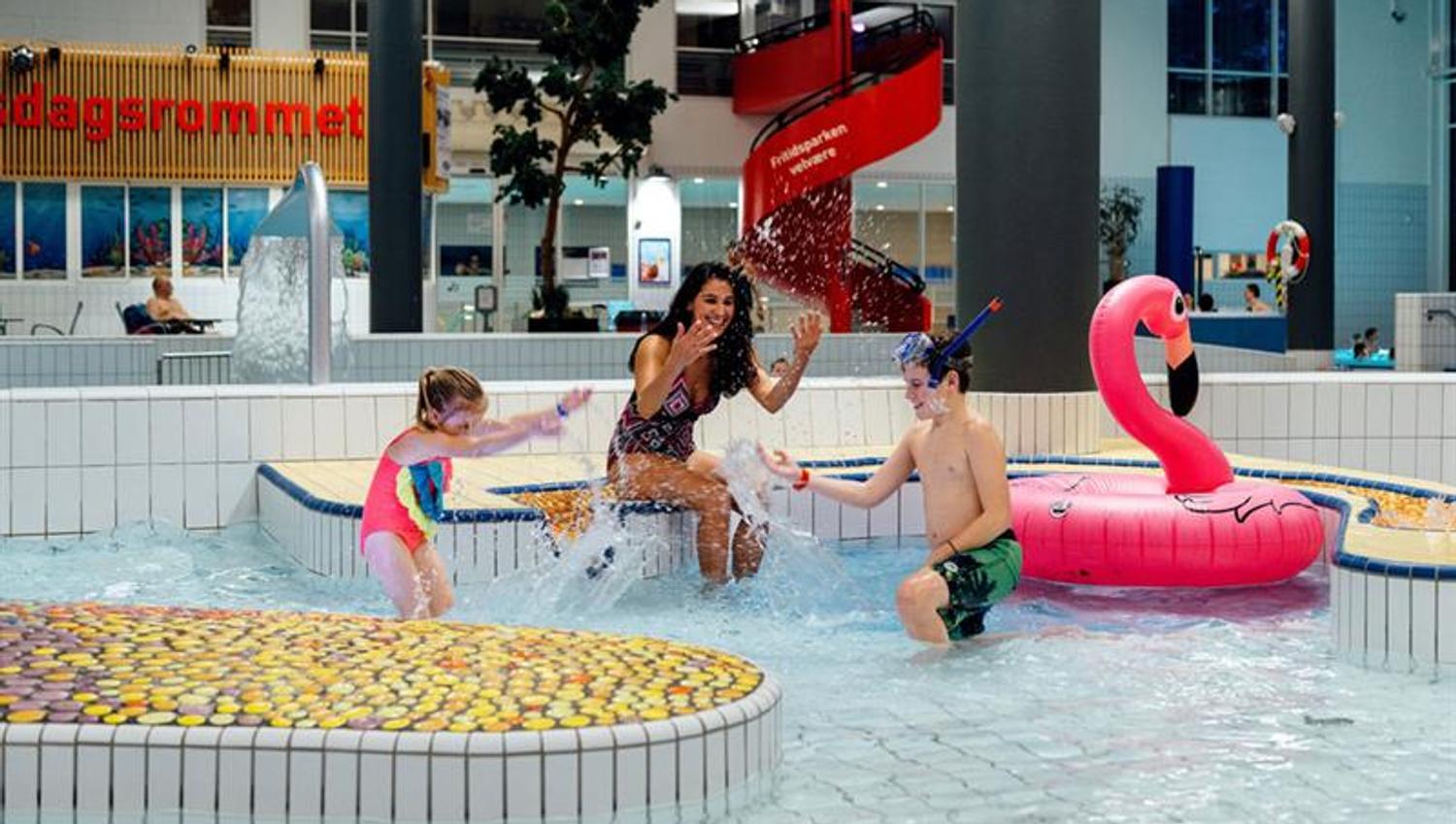 mother with children at water park in Skien leisure park