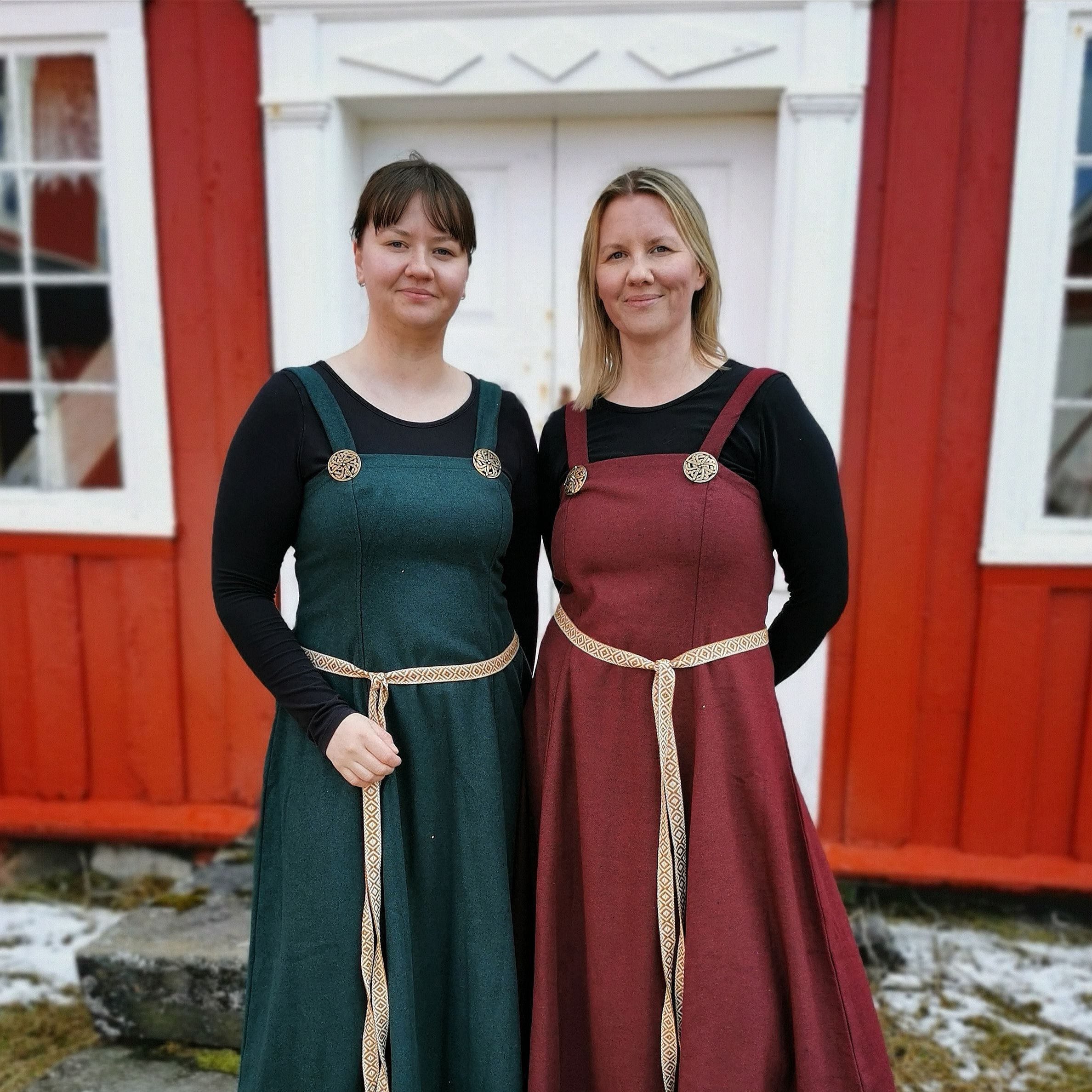 two ladies dressed in traditional clothes
