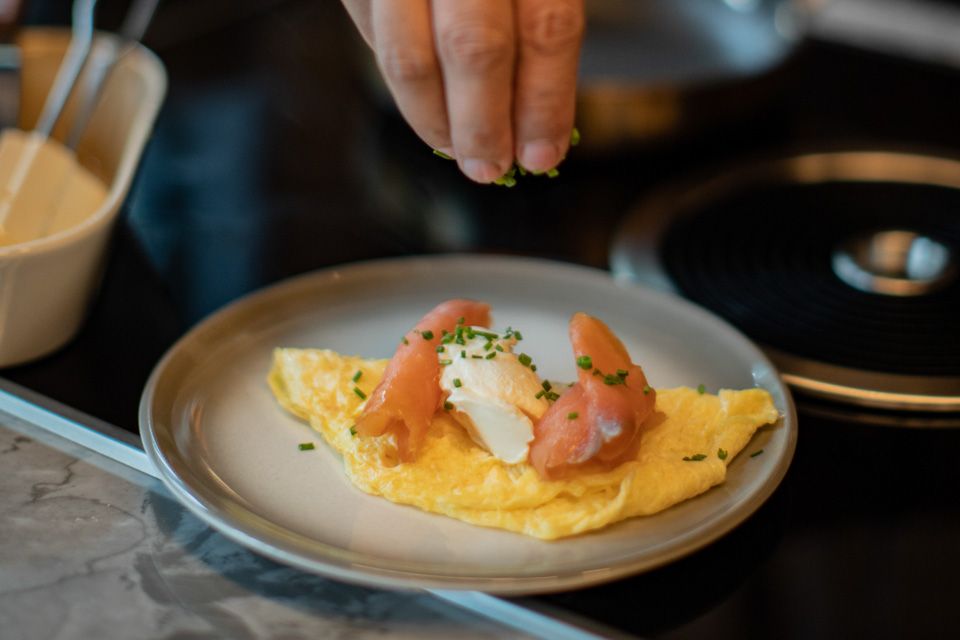 Breakfast omelett chef hands