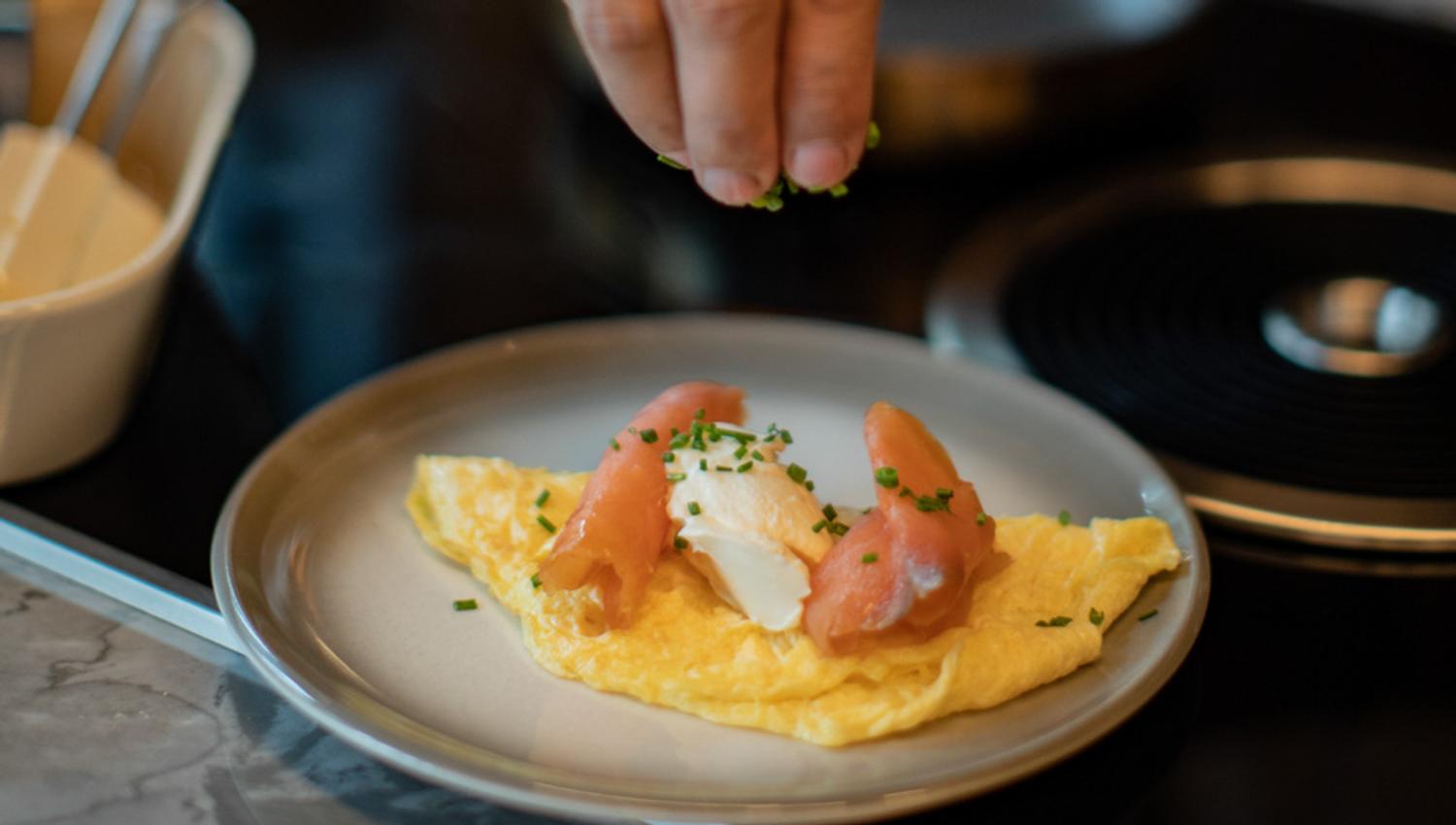 Breakfast omelett chef hands