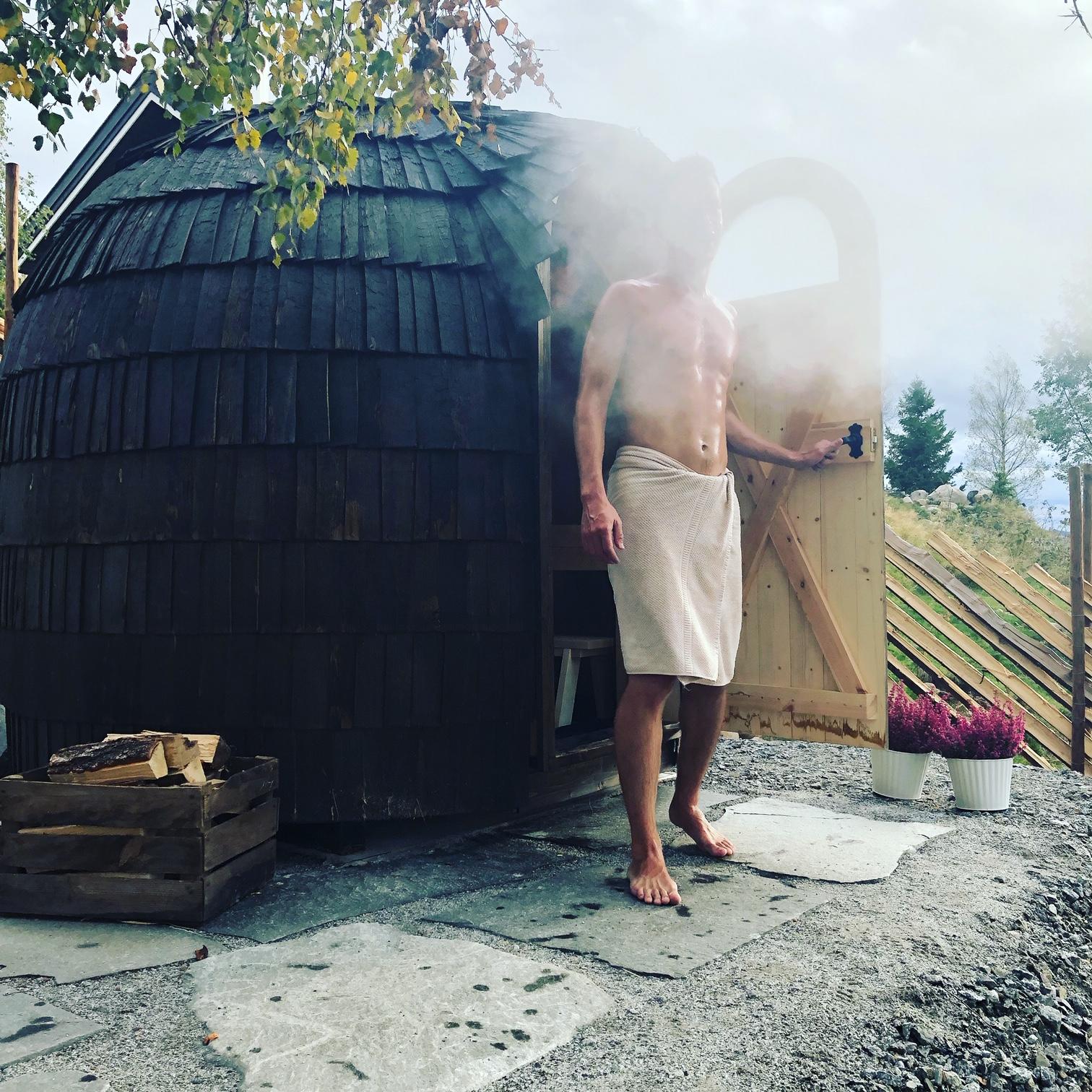 man infront of a sauna