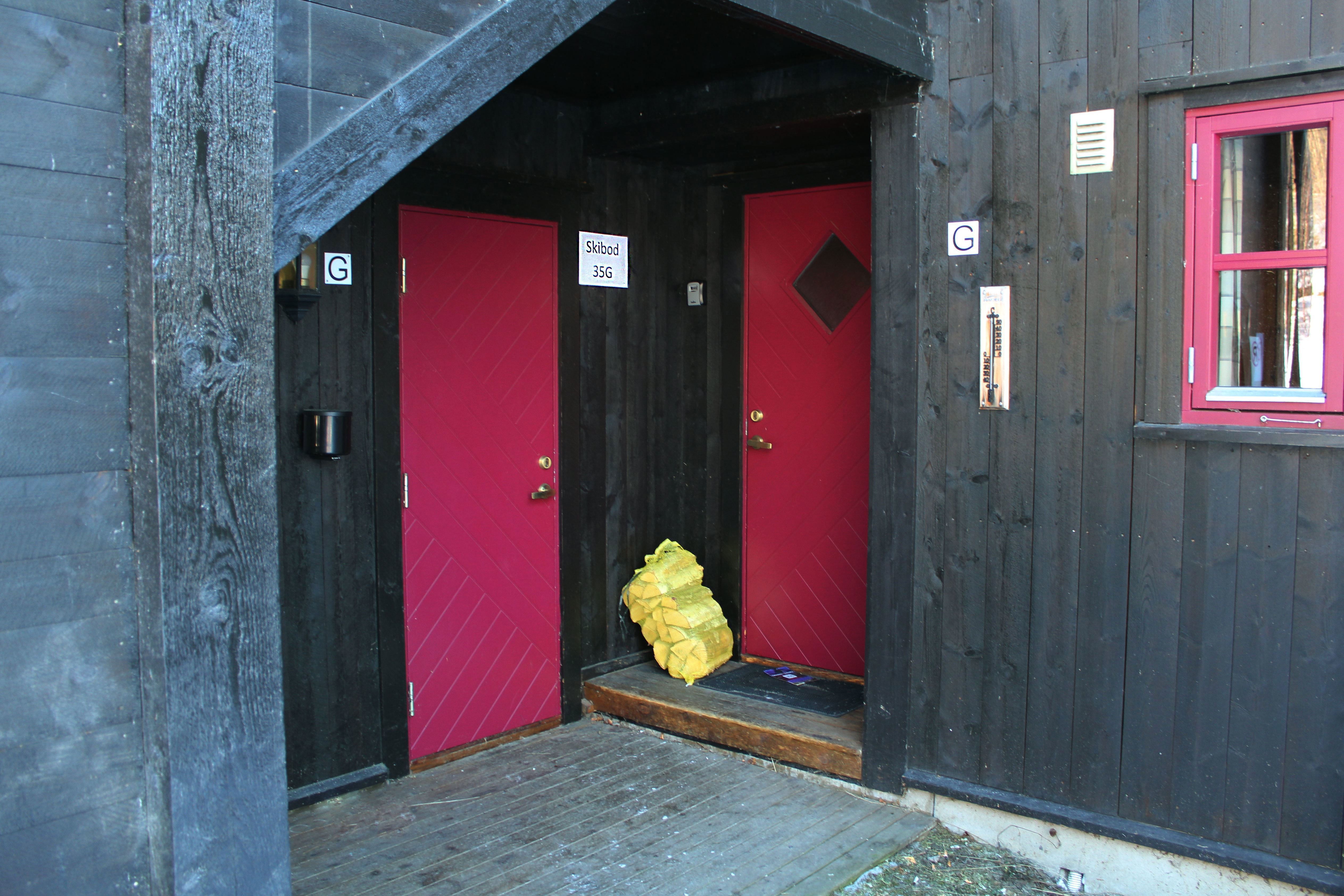 Two red doors in one building.