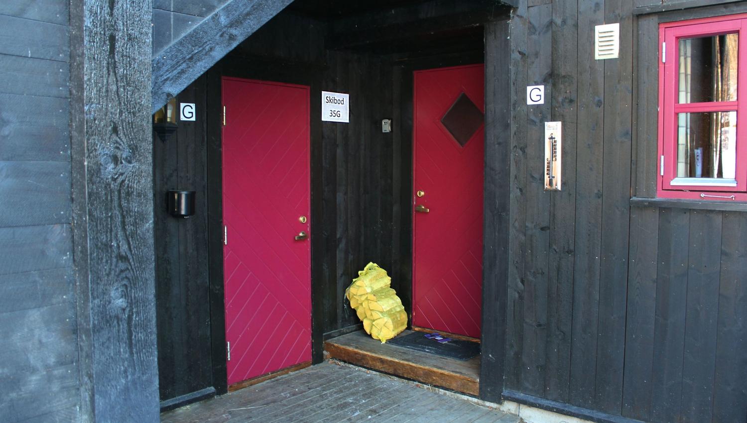 Two red doors in one building.