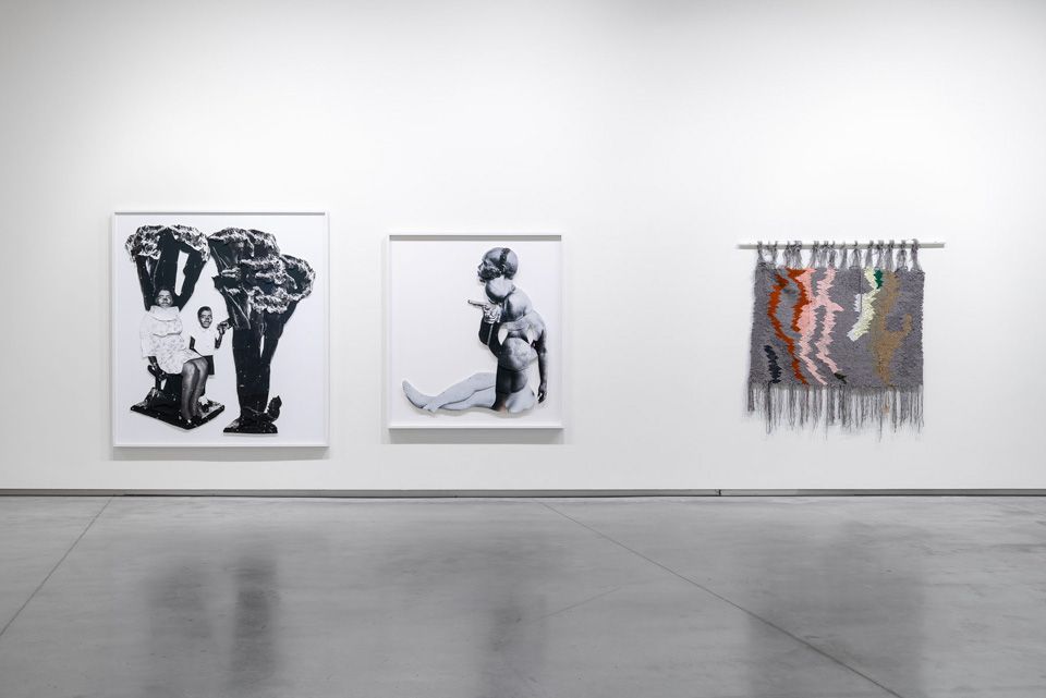 Atworks on white wall