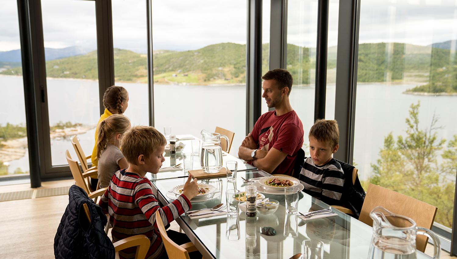 family enjoying themselves at Panorama Kafe at Hardangervidda National Park Center