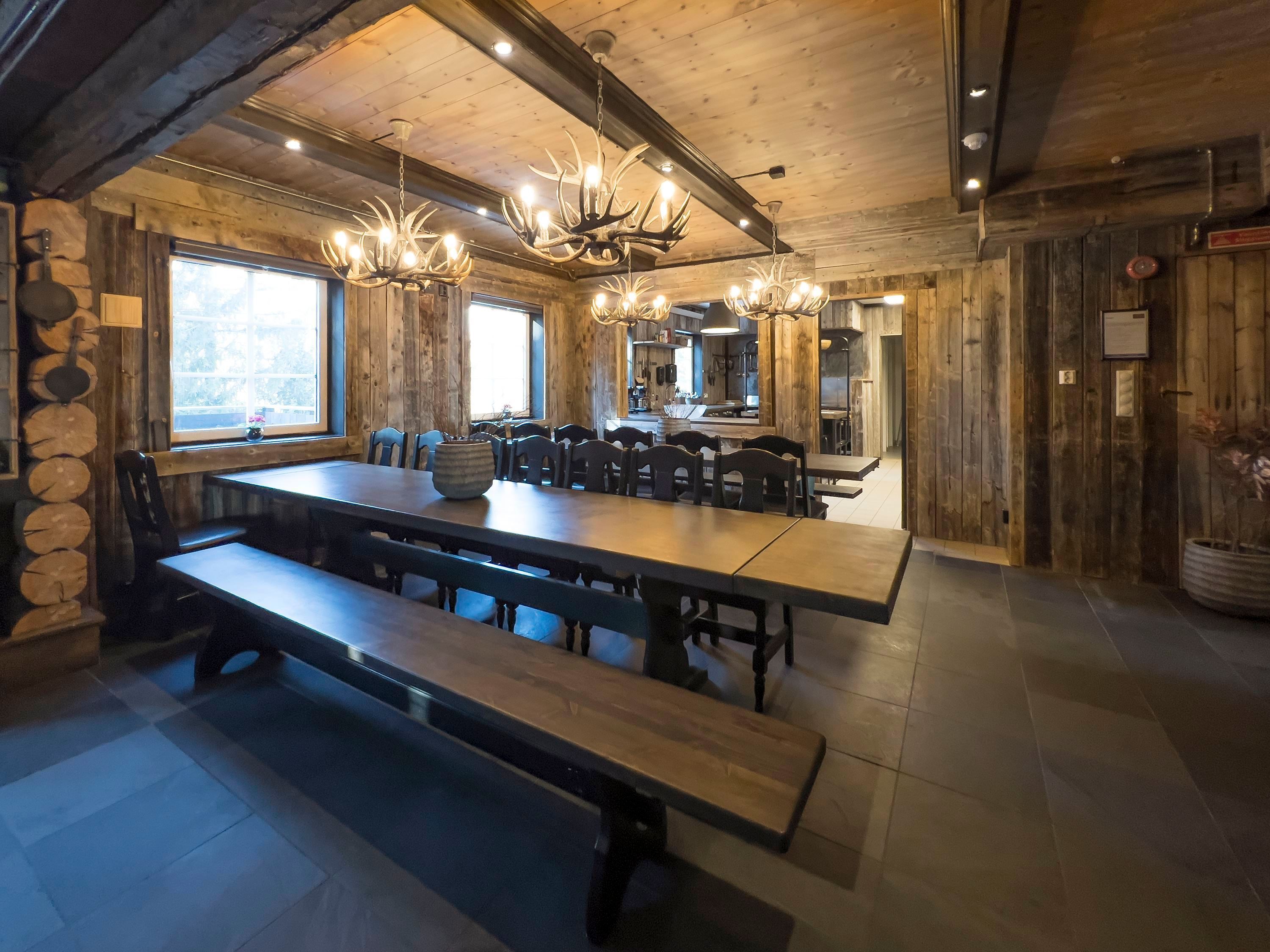 Living room with table and benches.