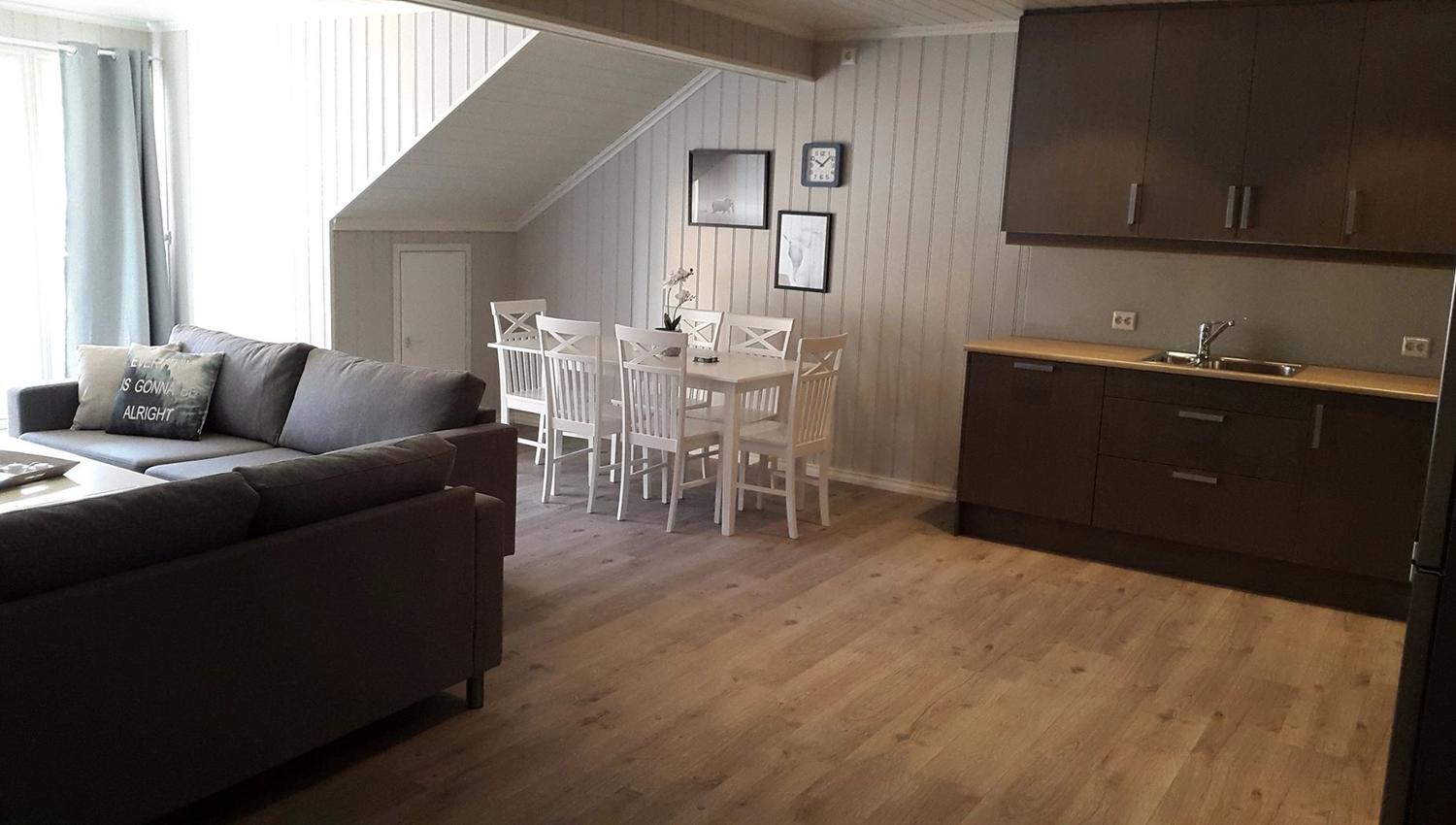 living room and kitchen in the apartment of Rognstranda camping