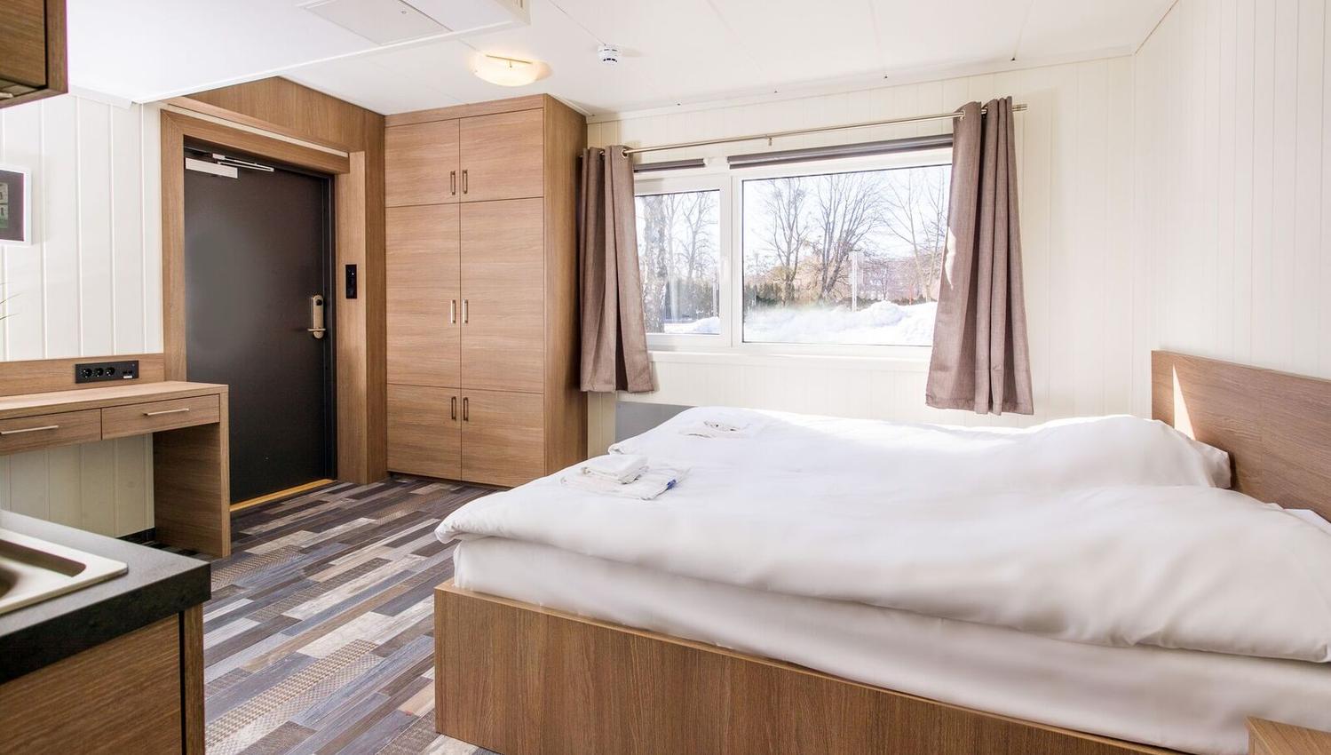 Soverom med kjøkkenkrok
